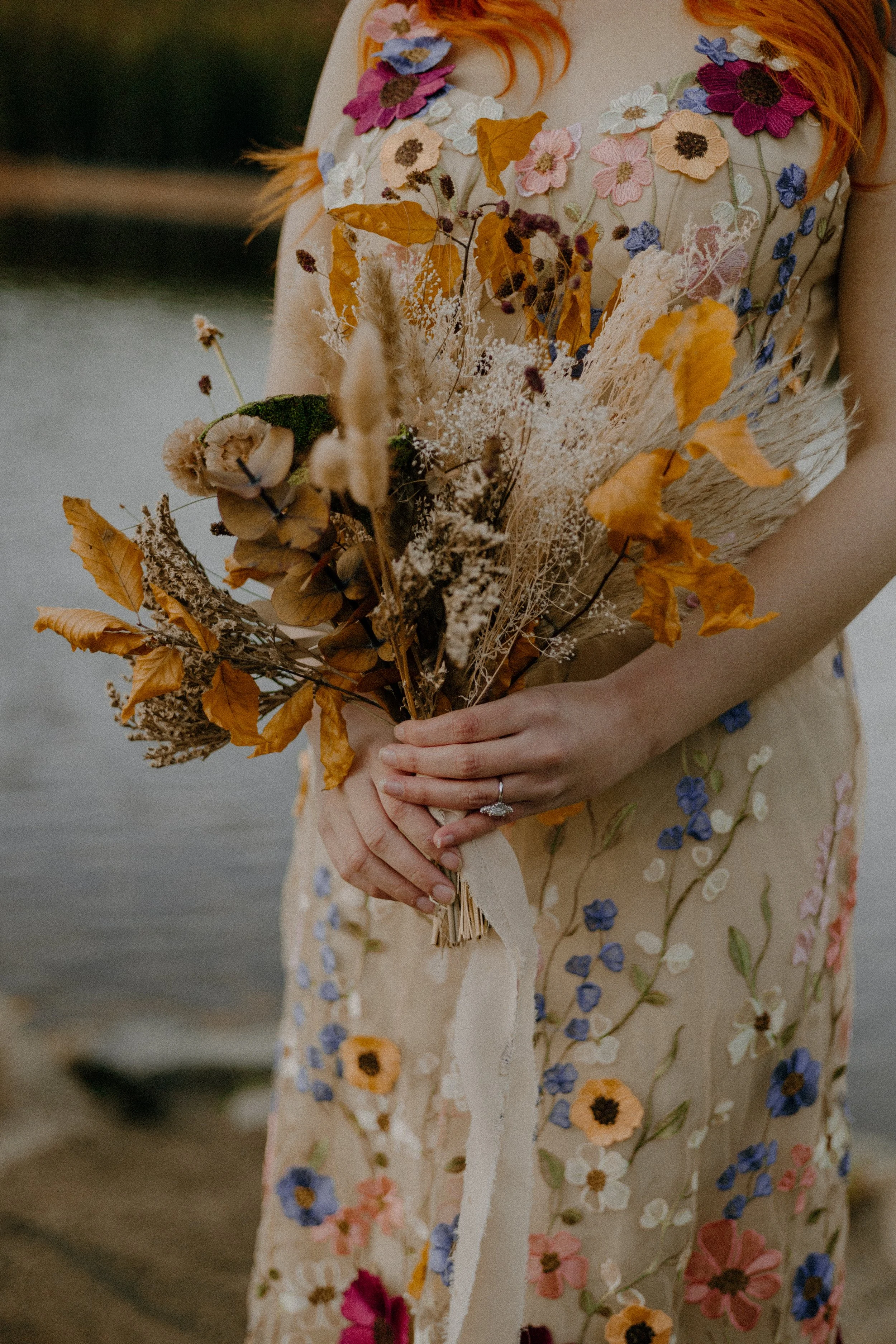 Houston & Texas Wedding & Elopement Photography – Bride holding golden bouquet close up near Echo Lake Colorado.