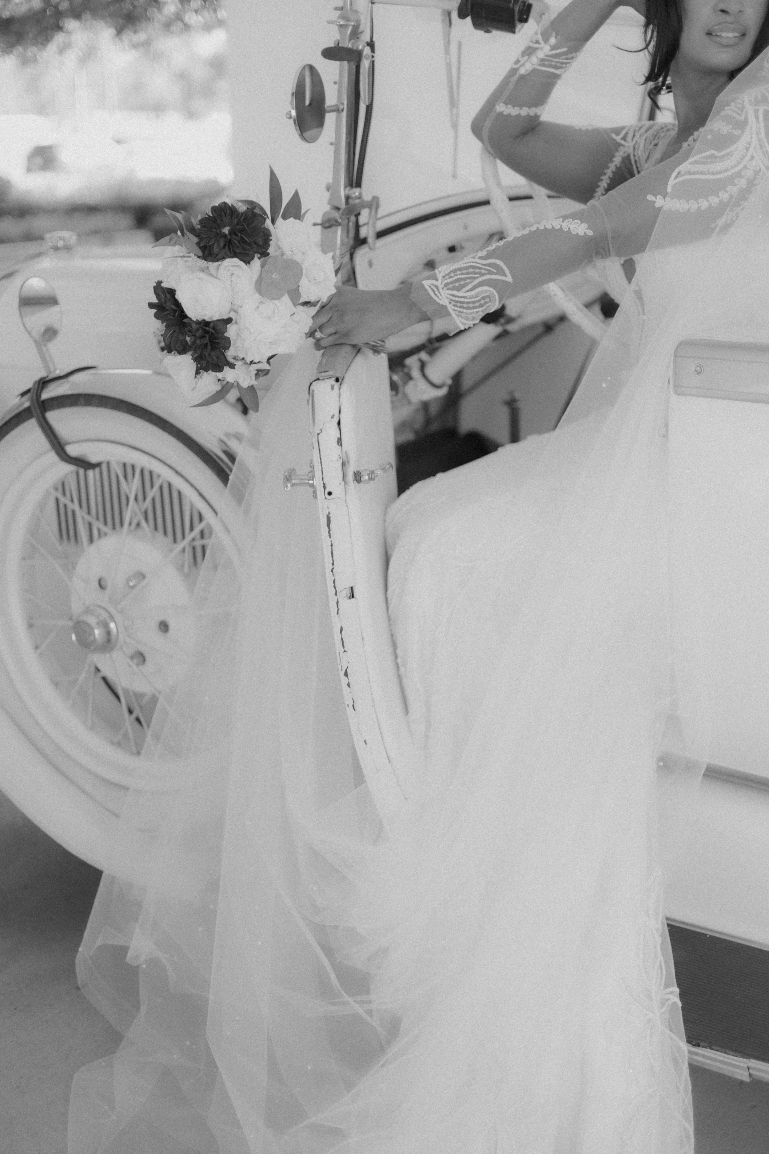Houston & Texas Family, Couples, Newborn, Maternity, Bridal Photography – Black and white detail bridal gown at vintage car, The Woodlands TX.