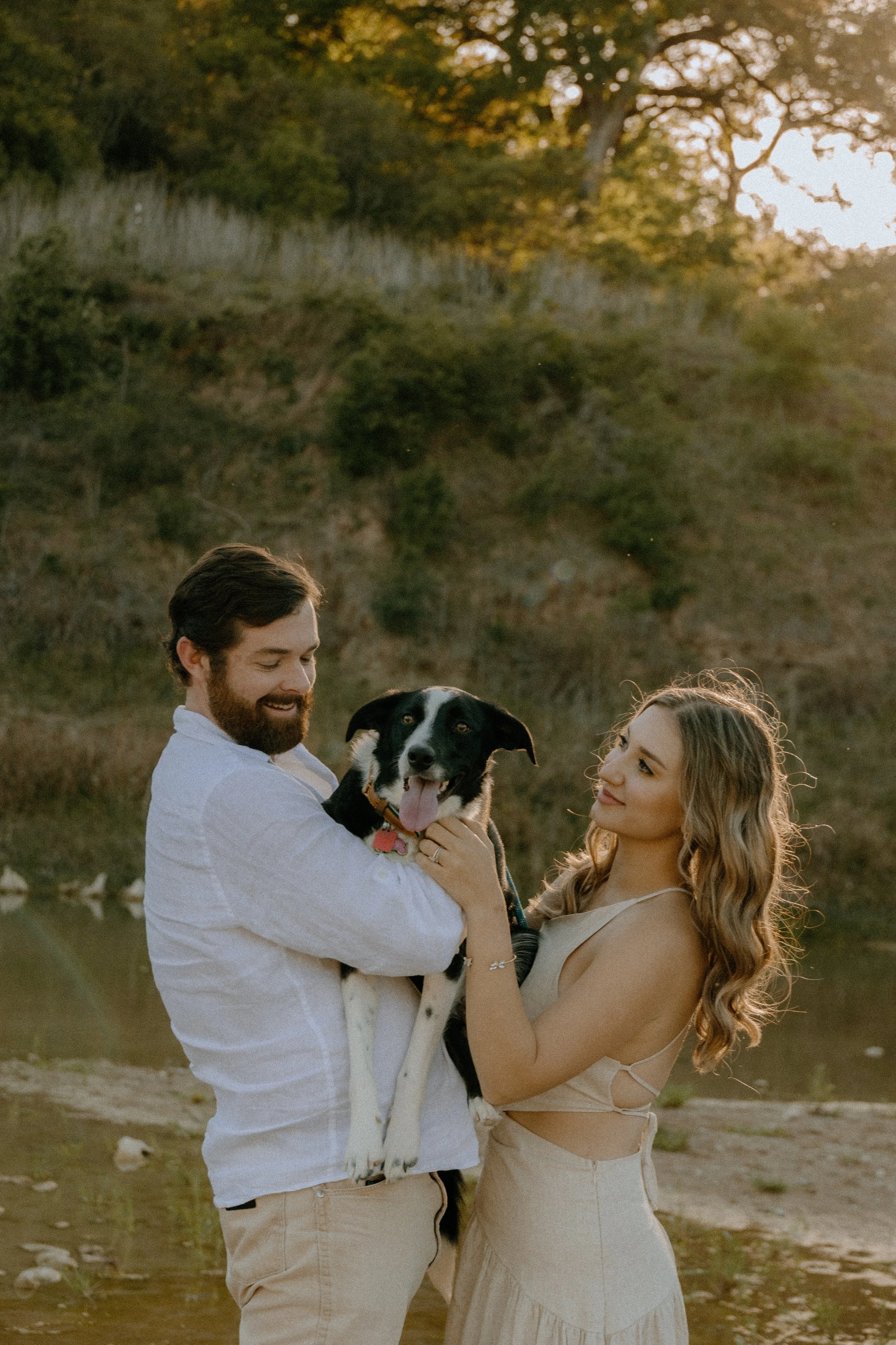Houston & Texas Family, Couples, Newborn, Maternity, Bridal Photography – Couple smiling with dog, Austin TX outdoor portraits.