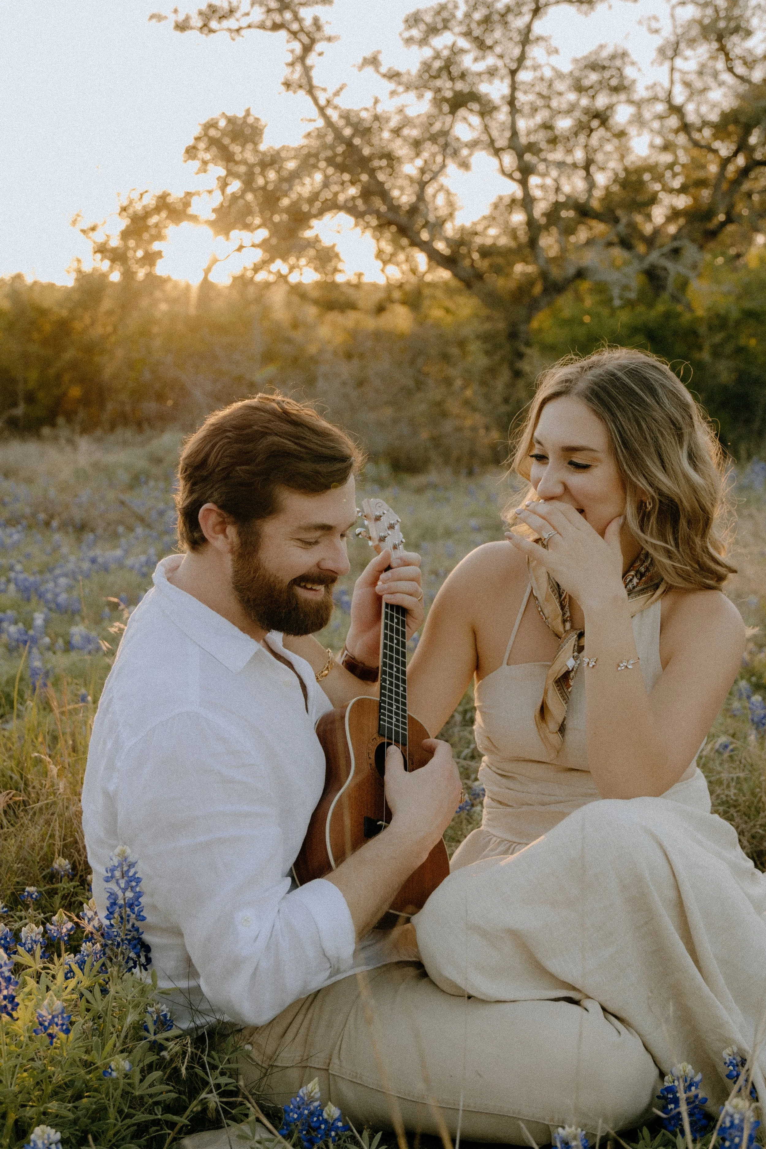 Houston & Texas Family, Couples, Newborn, Maternity, Bridal Photography – Warm golden hour portraits with guitar in Austin TX wildflowers.