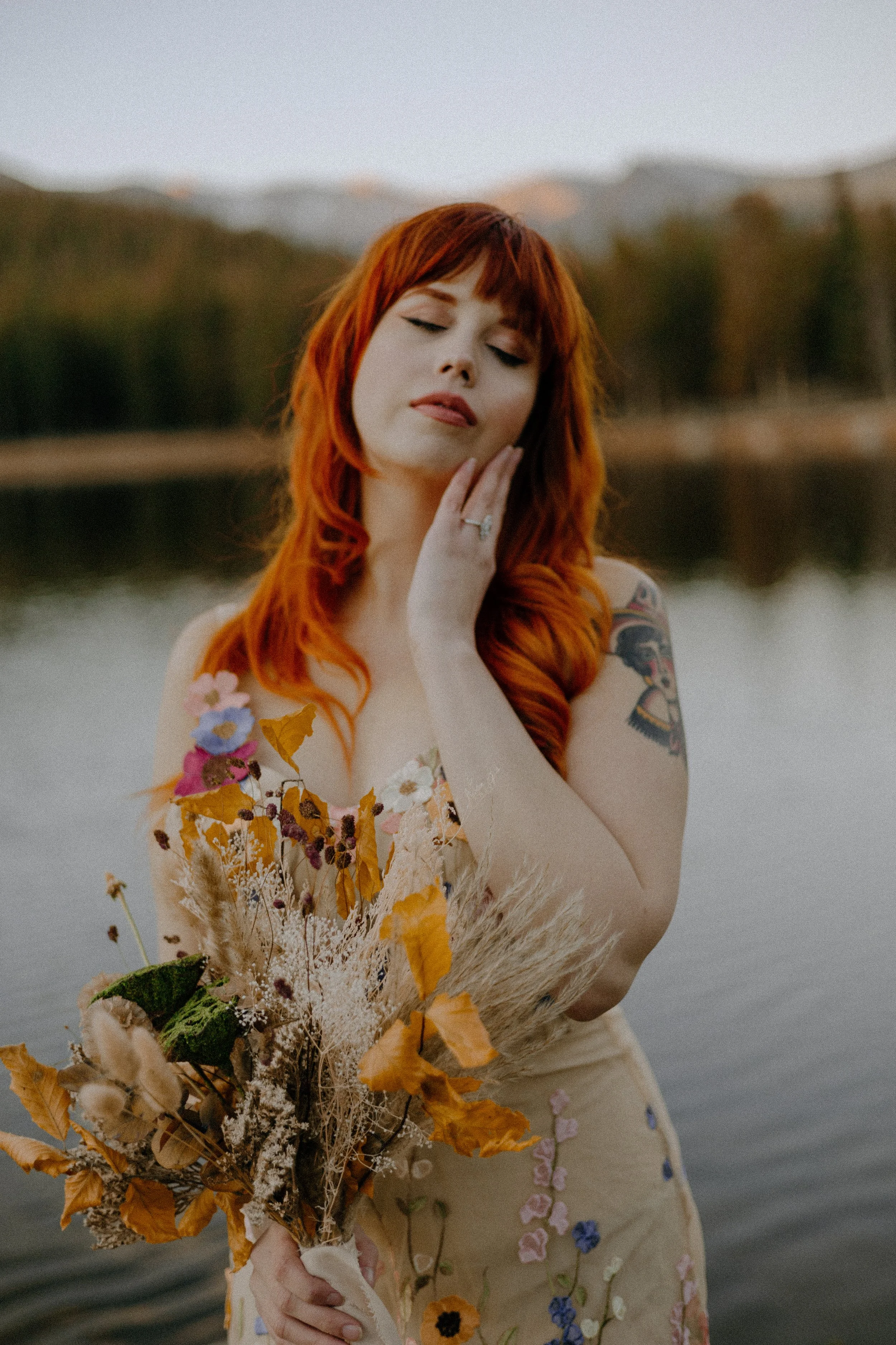 Houston & Texas Wedding & Elopement Photography – Bride gazing sideways near golden foliage at Echo Lake Colorado.
