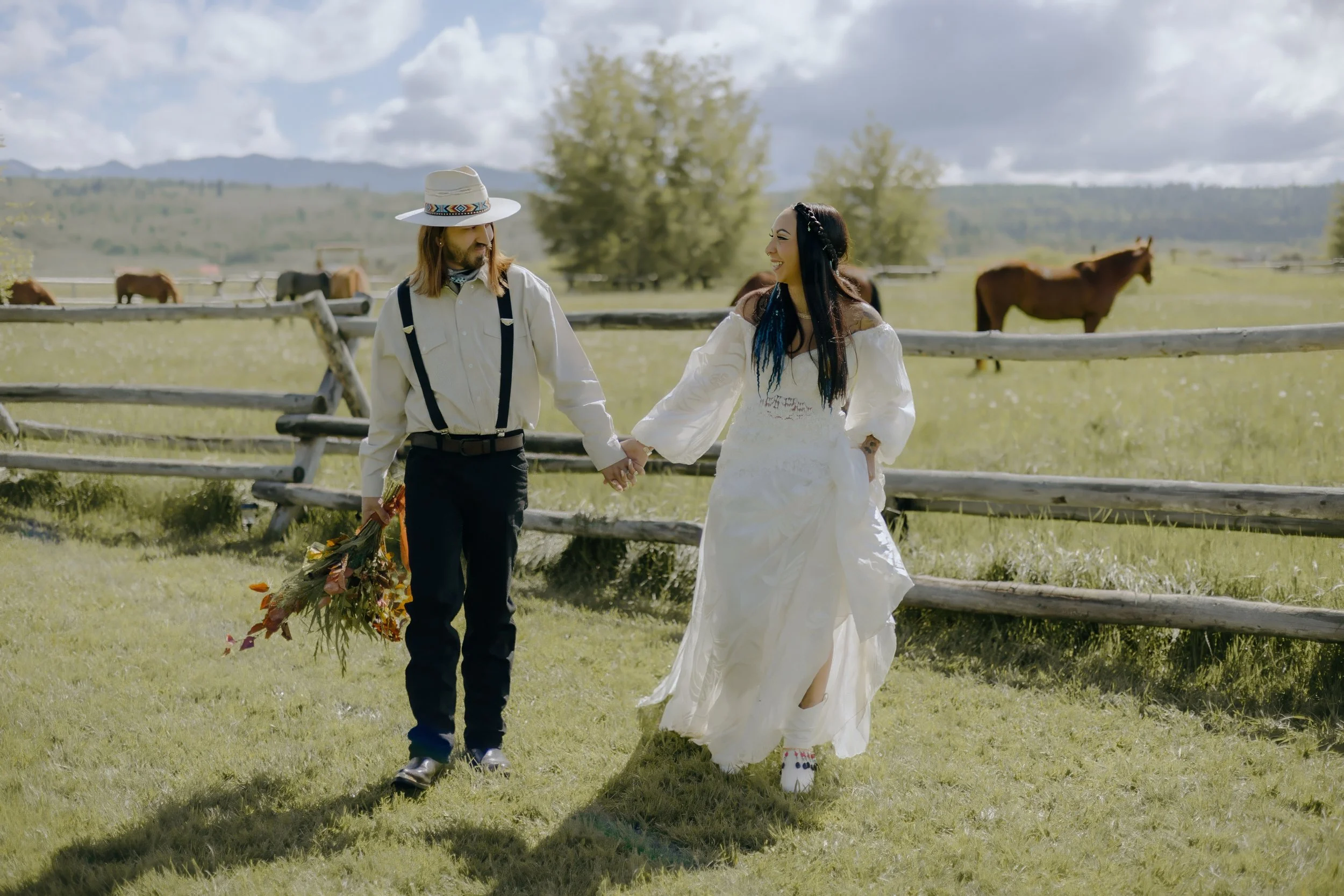 Houston & Texas Wedding & Elopement Photography – Close embrace with veil and western field at Diamond Cross Ranch.