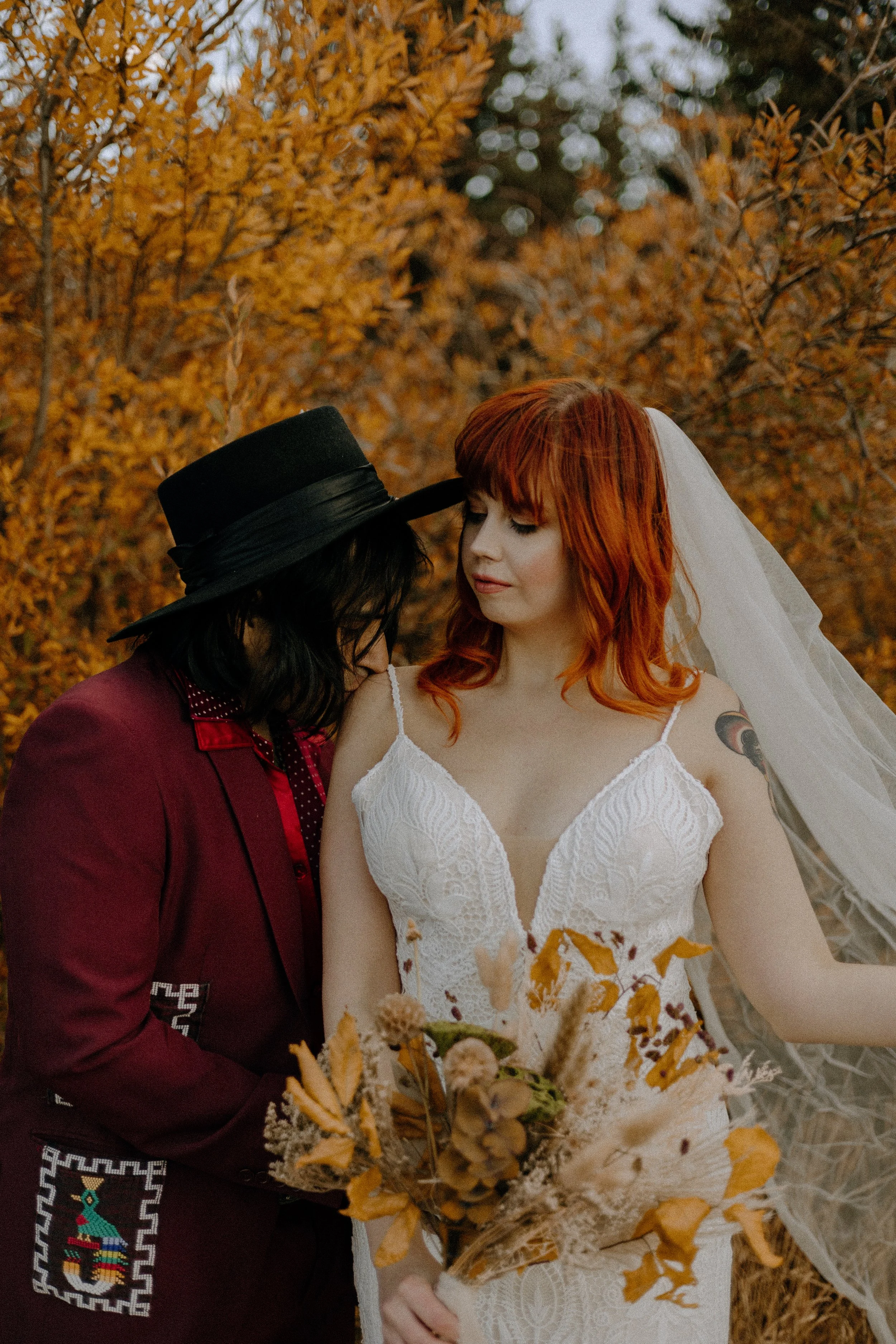 Houston & Texas Wedding & Elopement Photography – Bride and groom holding bouquet together at Echo Lake Colorado.
