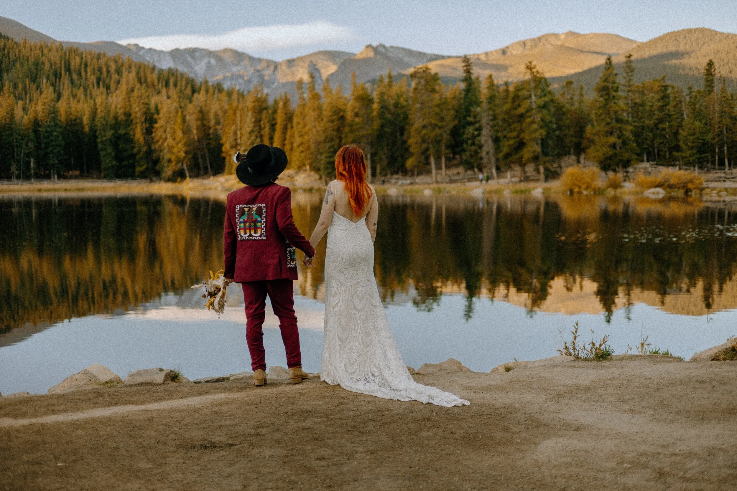 Houston & Texas Wedding & Elopement Photography – Bride and groom walking toward mountains at Echo Lake Colorado.