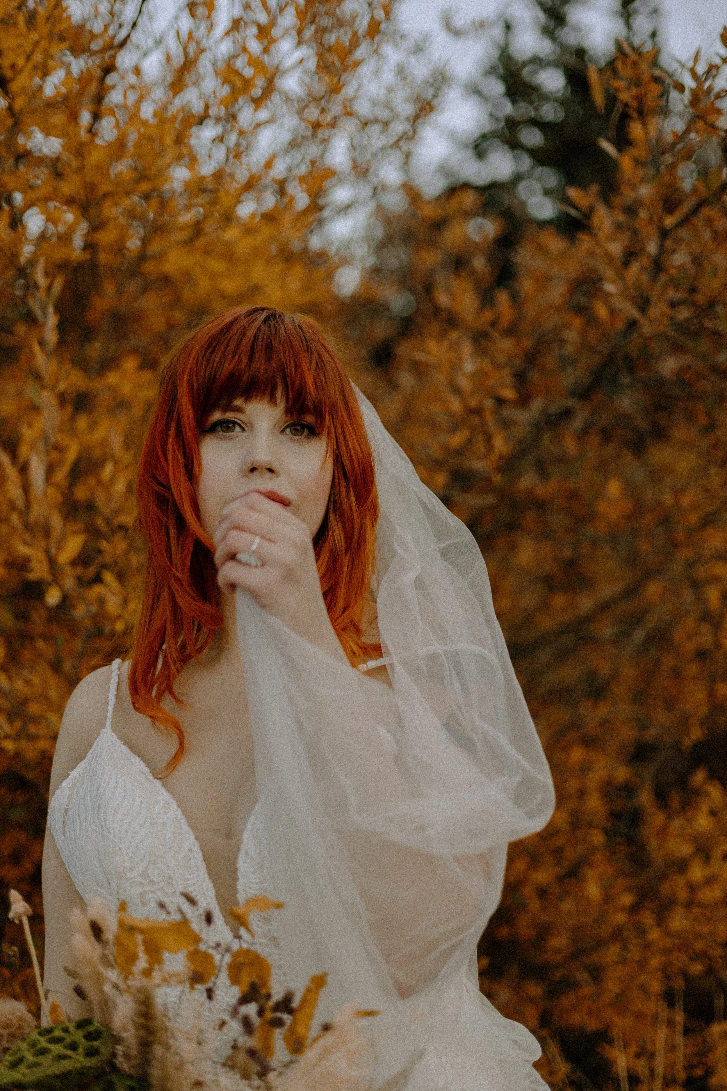 Houston & Texas Wedding & Elopement Photography – Bride smiling in golden forest near Echo Lake Colorado elopement.