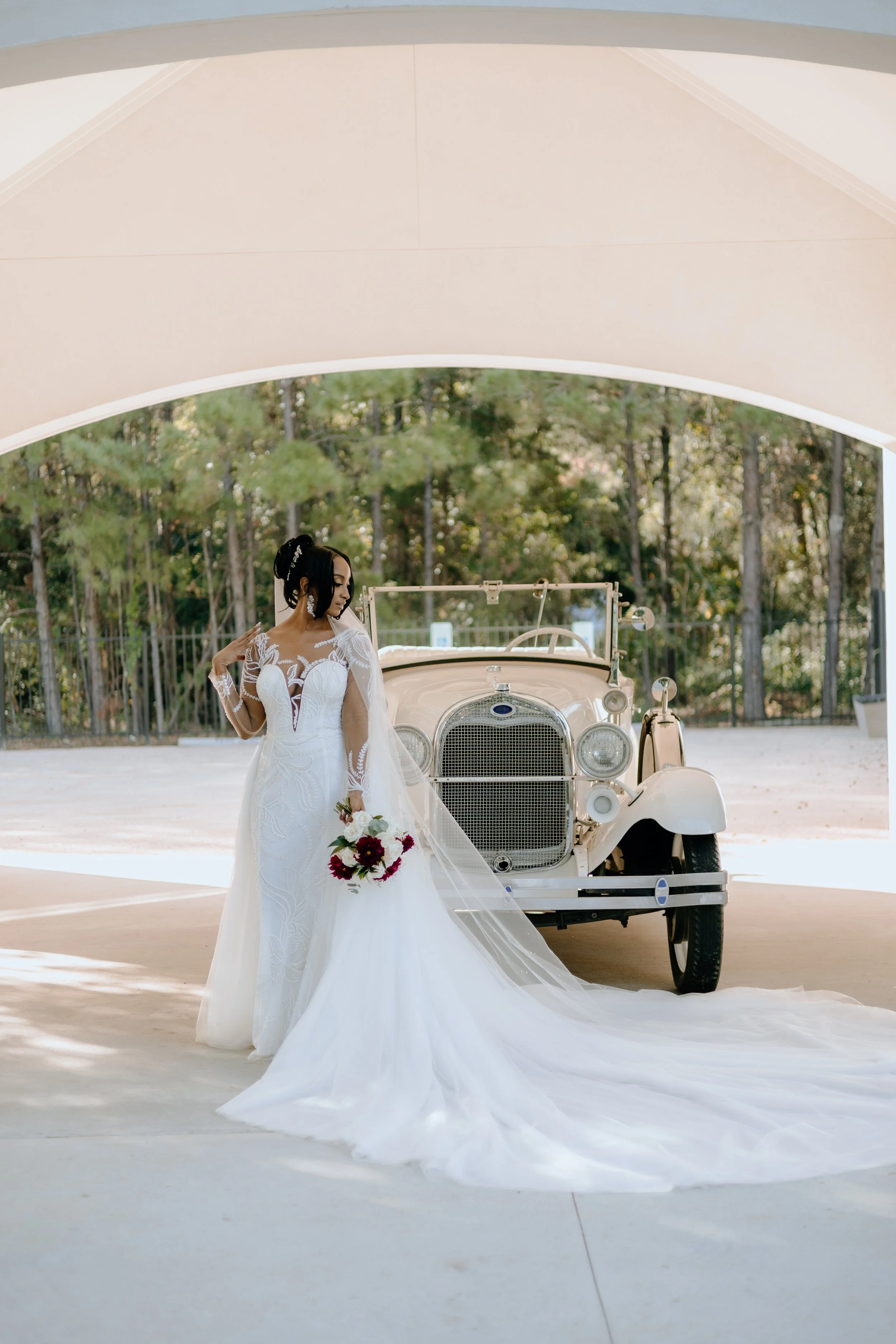Houston & Texas Family, Couples, Newborn, Maternity, Bridal Photography – Bride posing with vintage car, Peach Orchard Venue bridal session.