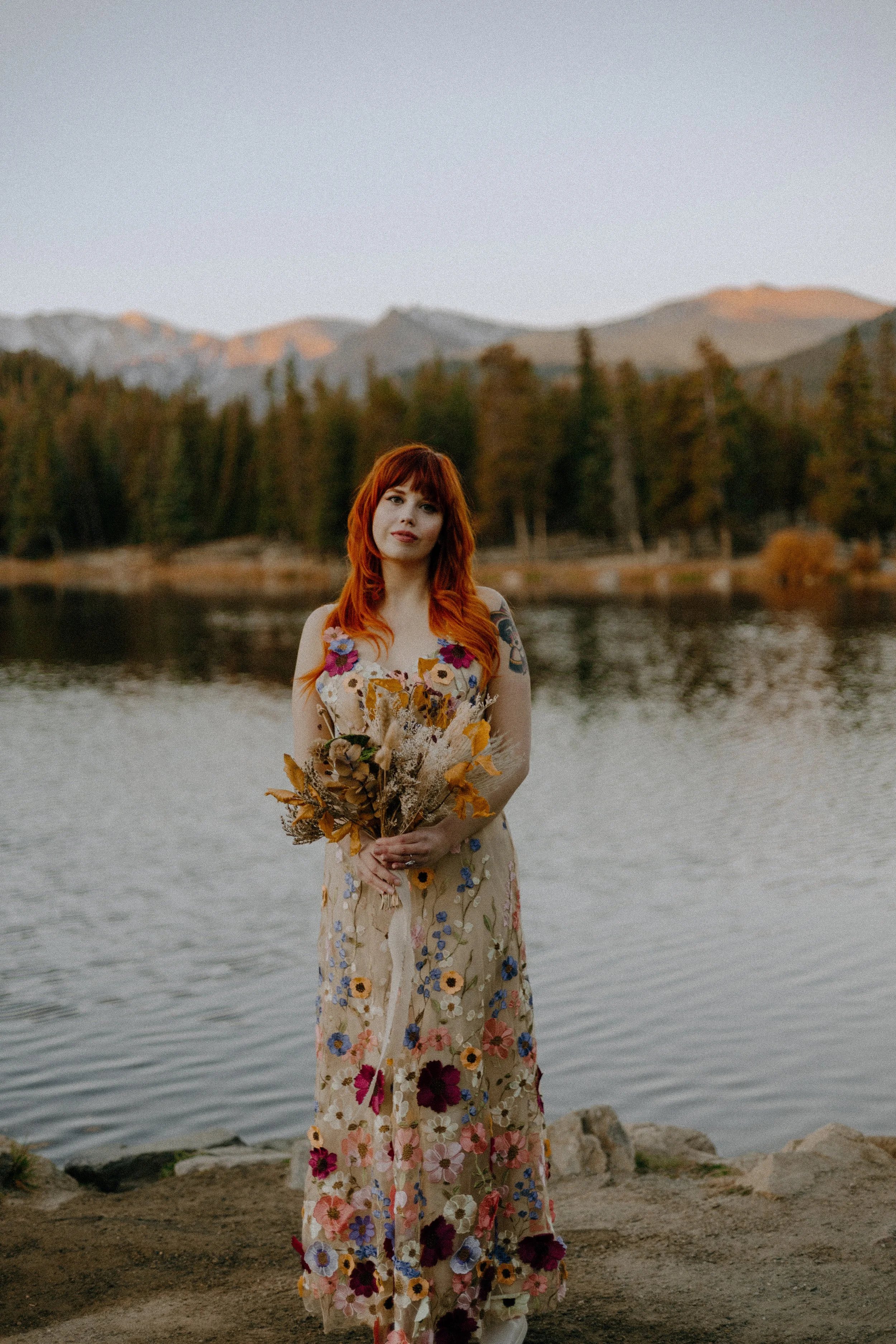 Houston & Texas Wedding & Elopement Photography – Bride gazing upward with bouquet at Echo Lake Colorado elopement.