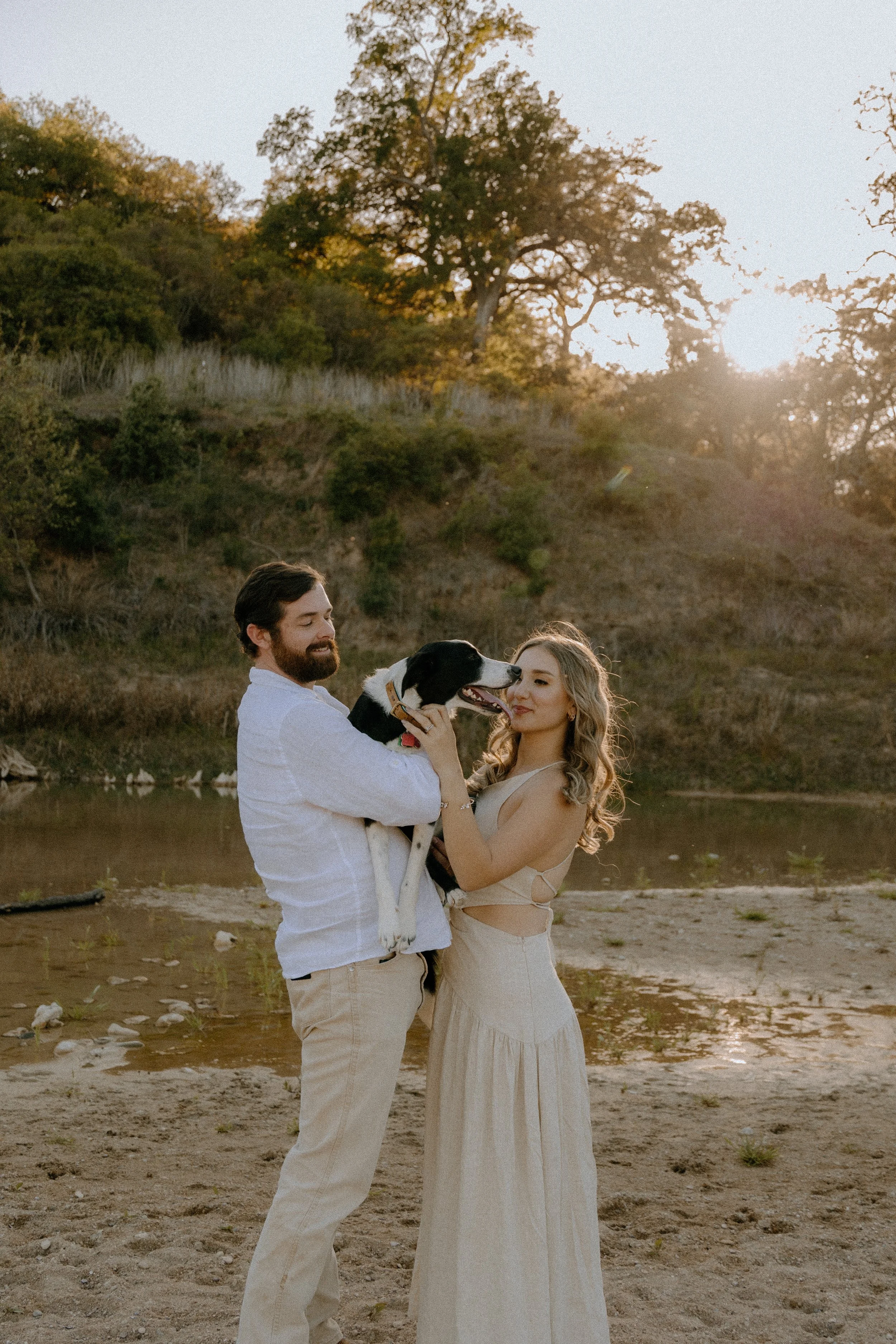 Houston & Texas Family, Couples, Newborn, Maternity, Bridal Photography – Couple holding dog at sunset in Austin TX portraits.