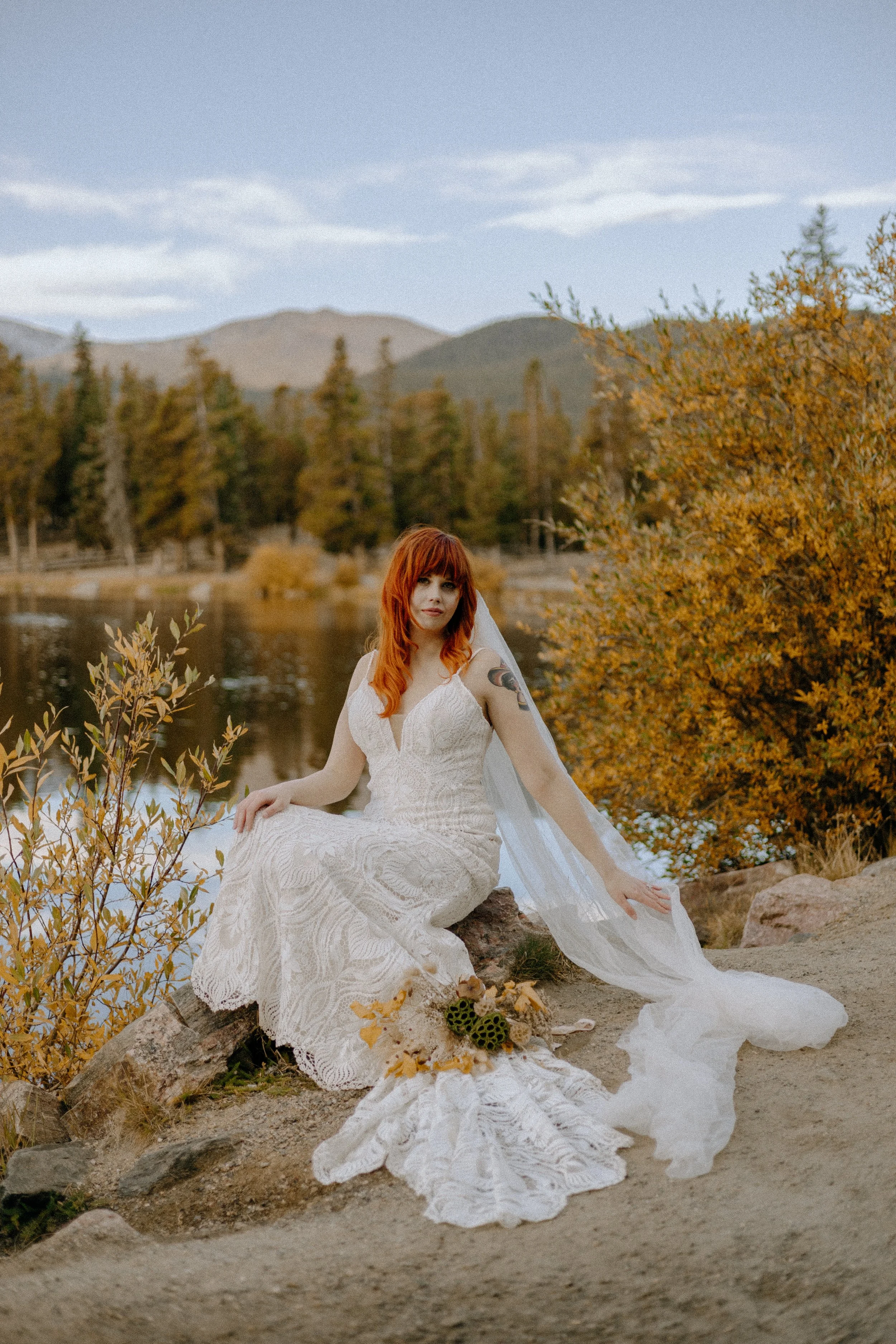 Houston & Texas Wedding & Elopement Photography – Bride relaxing in wildflower meadow near Echo Lake Colorado elopement.