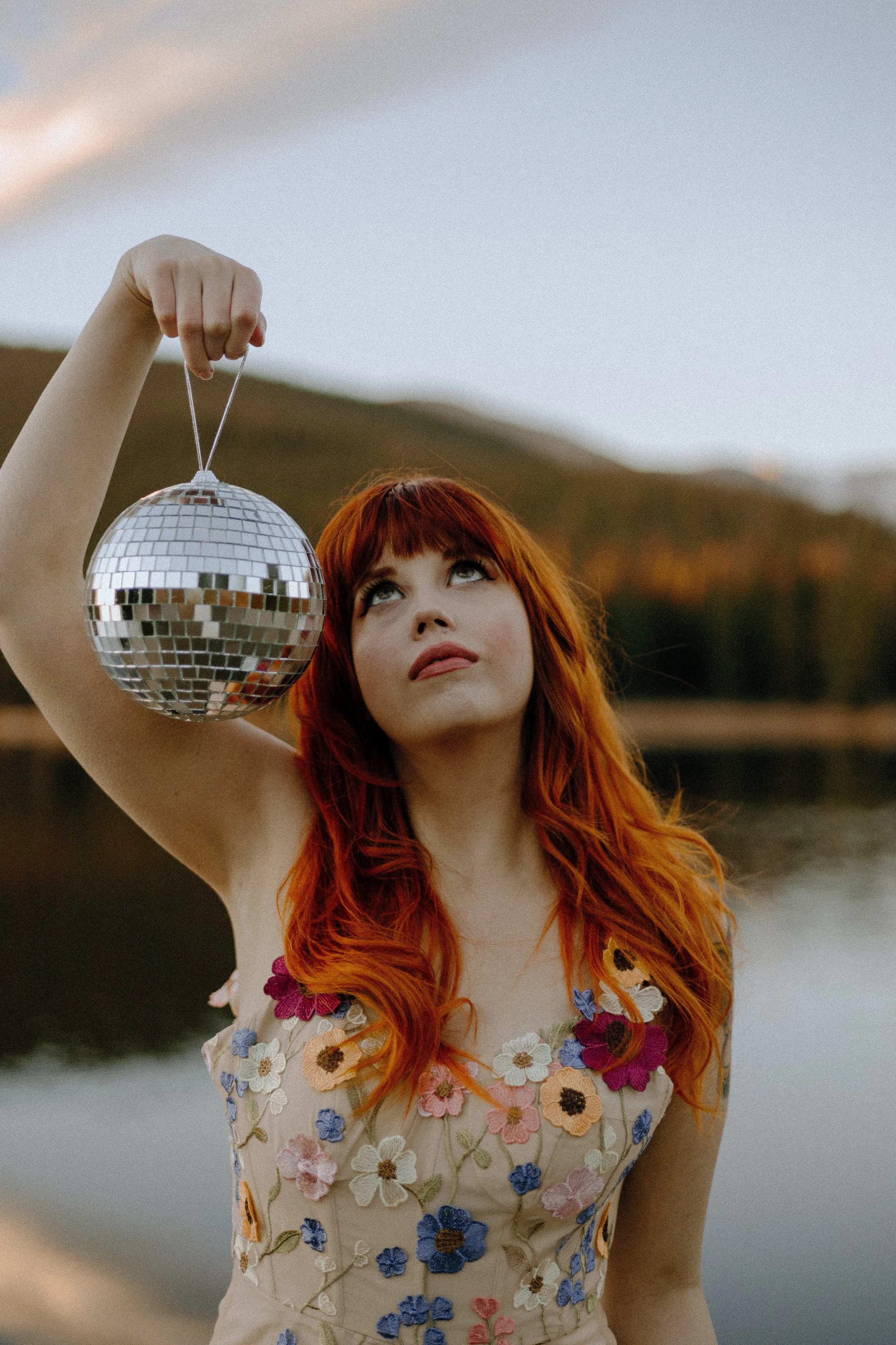Houston & Texas Wedding & Elopement Photography – Bride holding disco ball close-up in Echo Lake Colorado elopement.