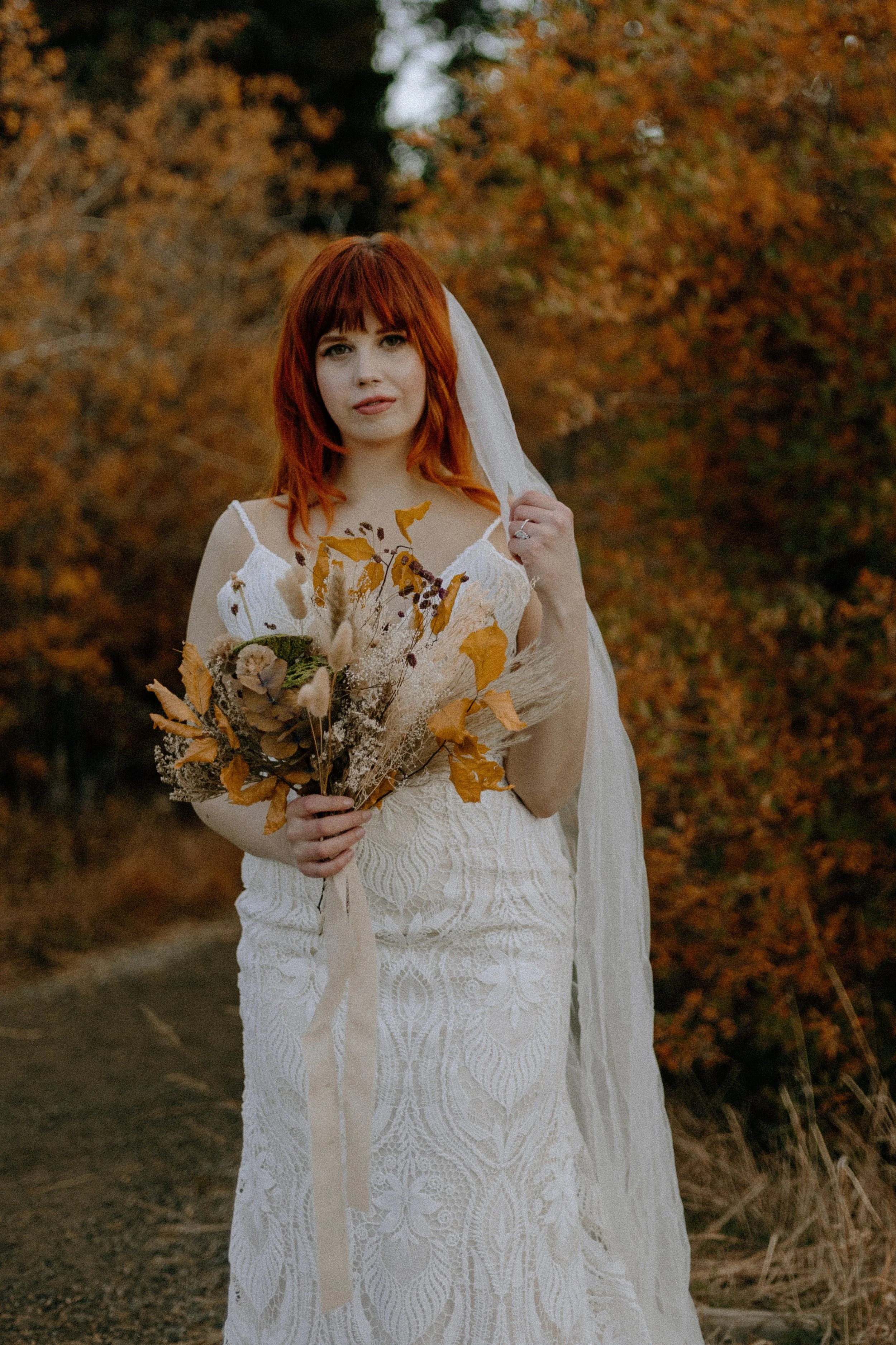 Houston & Texas Wedding & Elopement Photography – Bride portrait in front of autumn trees at Echo Lake Colorado.