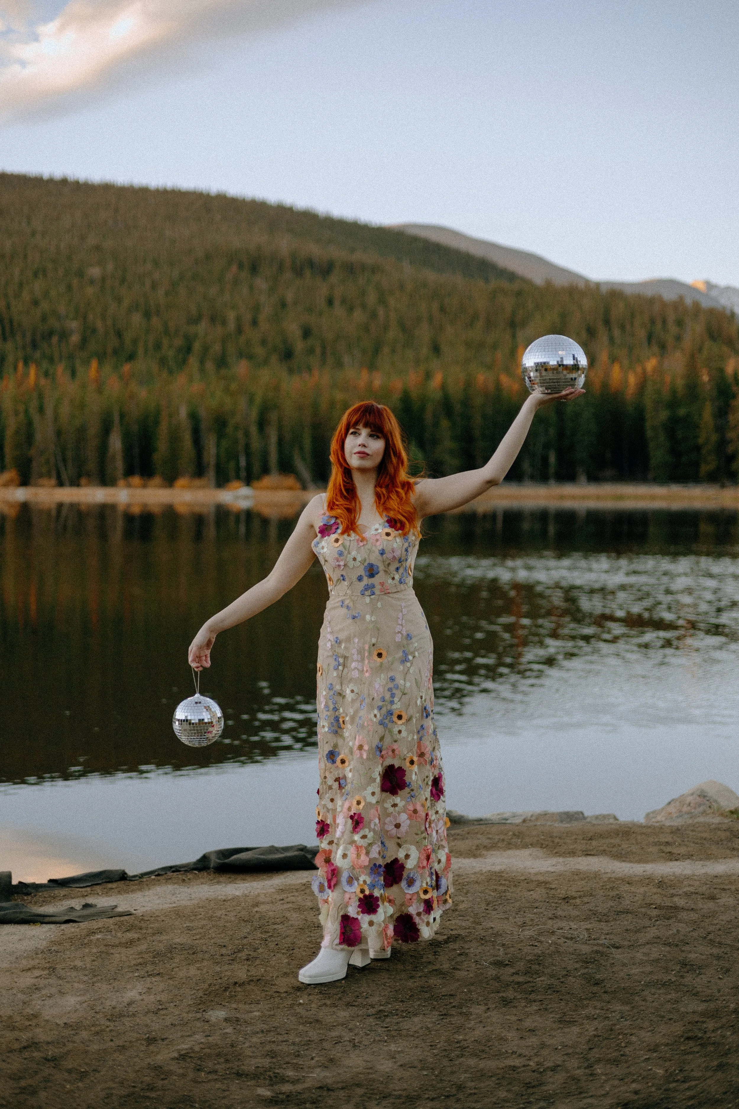 Houston & Texas Wedding & Elopement Photography – Bride holding disco ball in lakeside forest at Echo Lake Colorado.