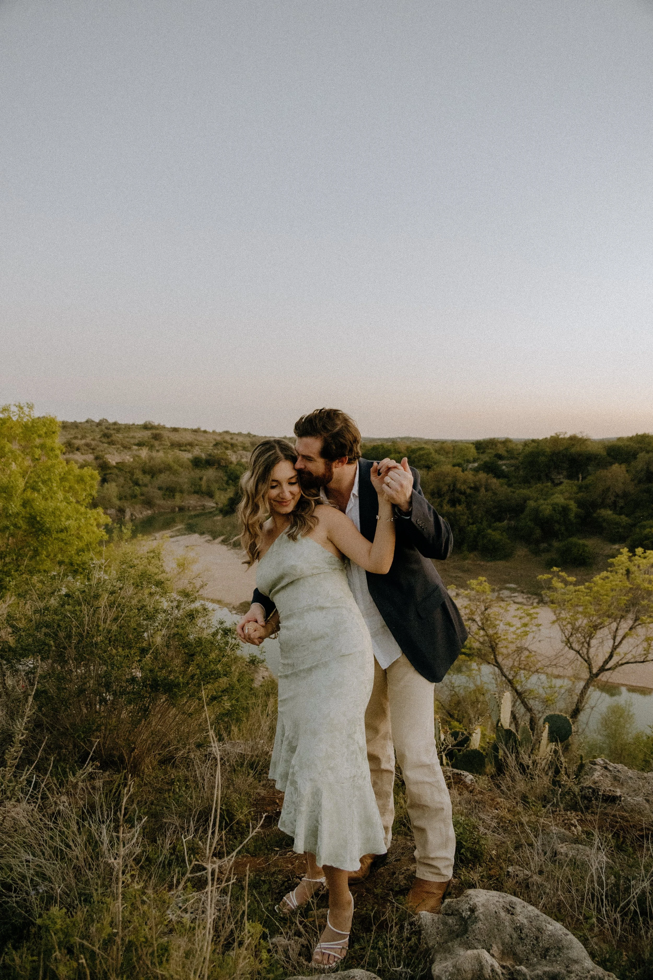 Houston & Texas Family, Couples, Newborn, Maternity, Bridal Photography – Romantic embrace in Austin TX outdoor couple portraits.
