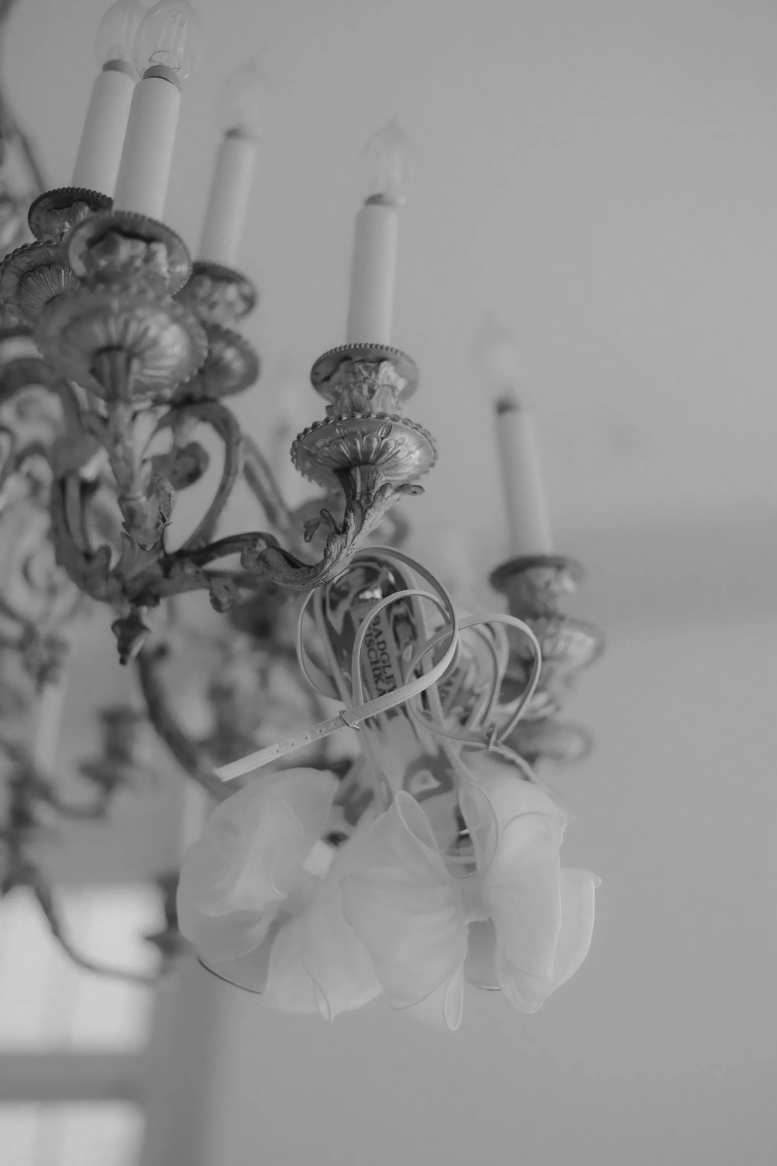 Houston & Texas Family, Couples, Newborn, Maternity, Bridal Photography – Monochrome bridal elegance under chandelier, Houston studio.
