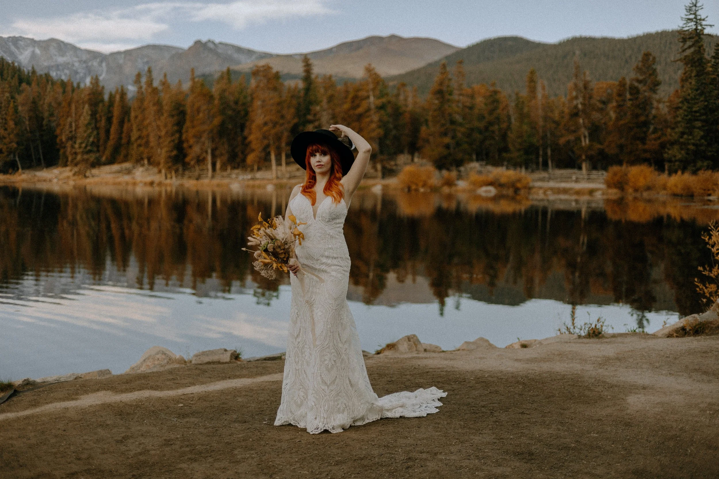 Houston & Texas Wedding & Elopement Photography – Bride twirling gown near alpine lake at Echo Lake, Colorado.