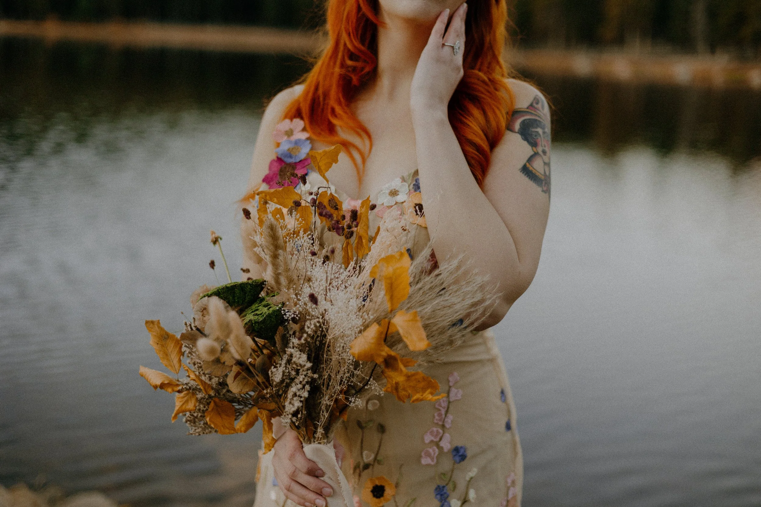 Houston & Texas Wedding & Elopement Photography – Bride looking serene with bouquet in autumn near Echo Lake Colorado.