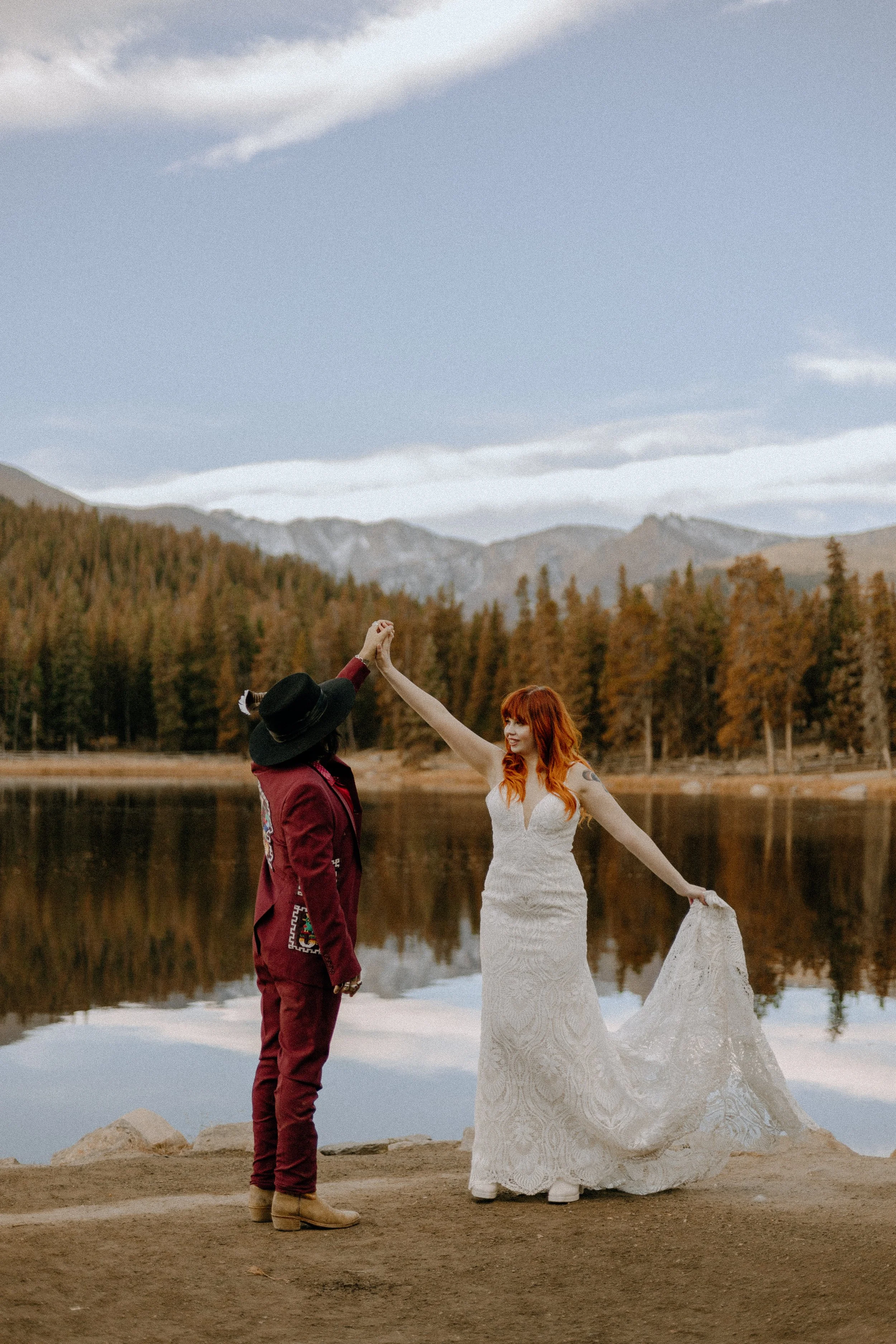 Houston & Texas Wedding & Elopement Photography – Bride and groom walking hand in hand along Echo Lake Colorado.
