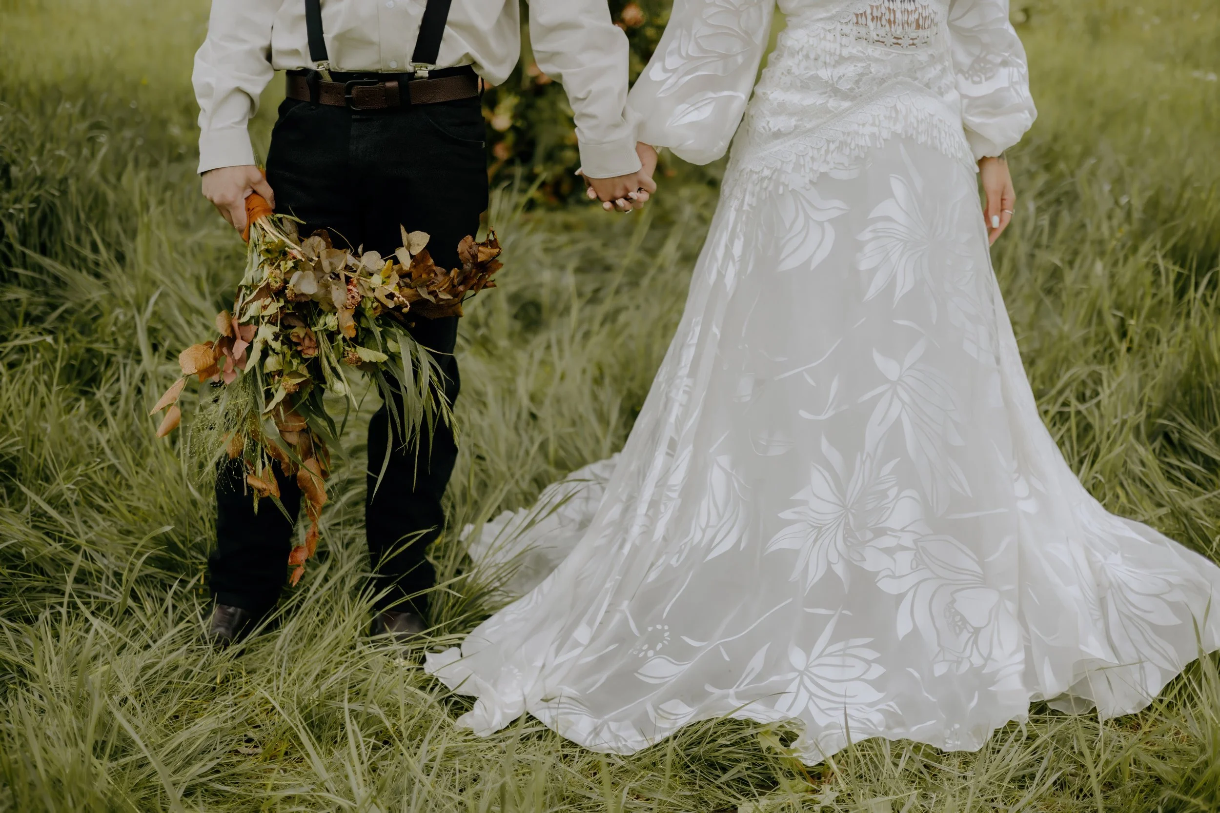 Houston & Texas Wedding & Elopement Photography – Detail of lace gown and pasture surroundings at Diamond Cross Ranch.