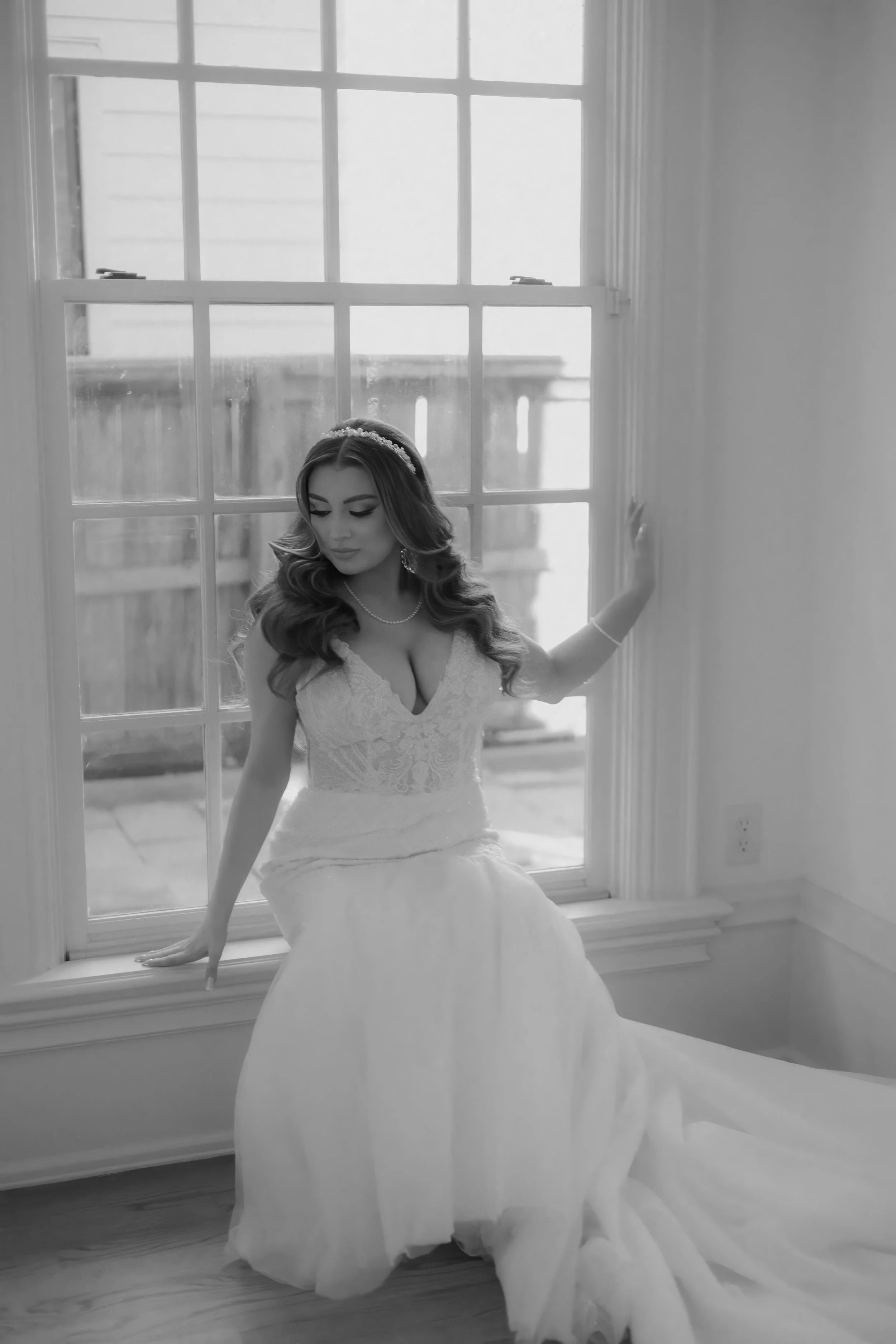 Houston & Texas Family, Couples, Newborn, Maternity, Bridal Photography – Bride resting chin on hand, gazing into distance, Houston luxury space.