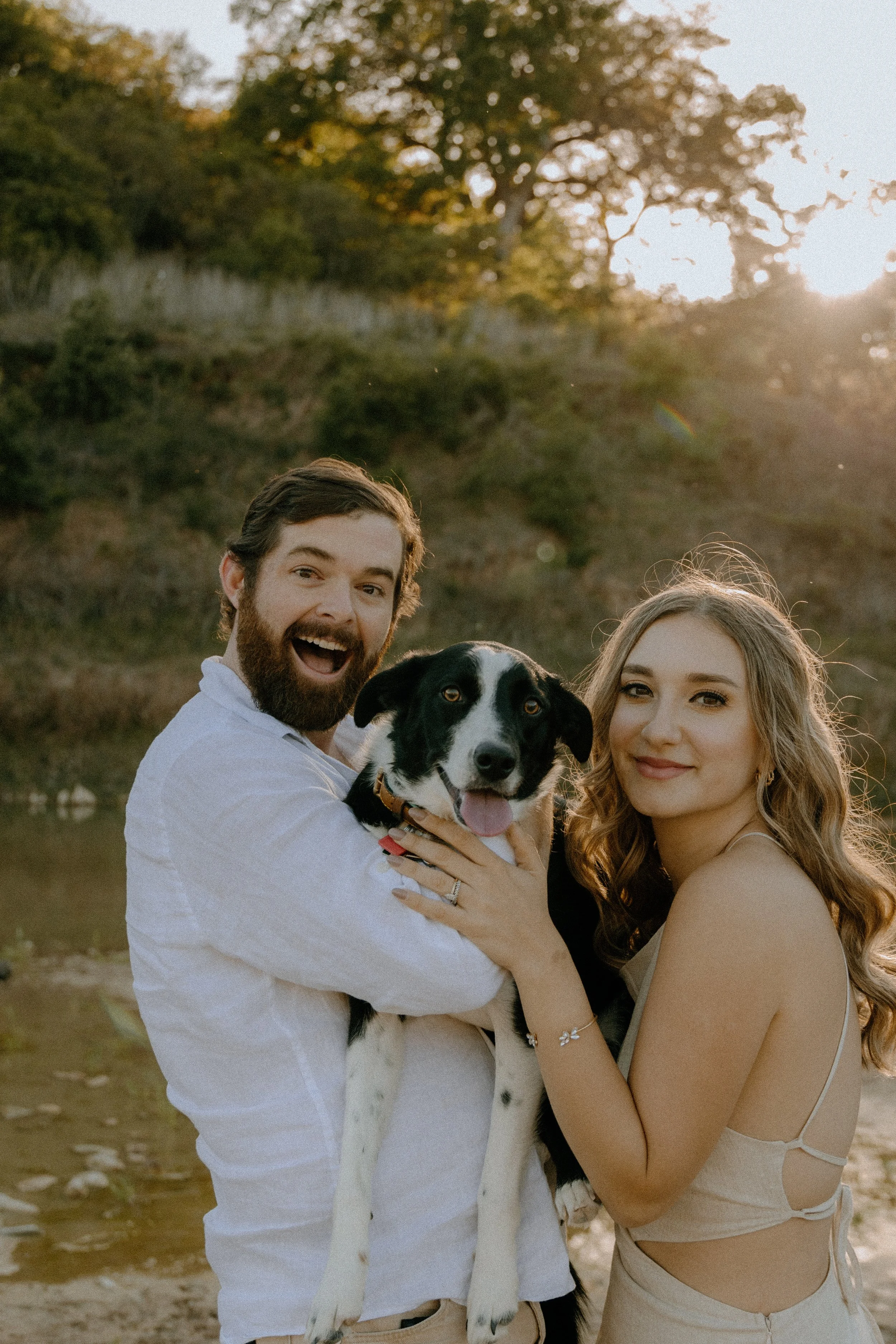 Houston & Texas Family, Couples, Newborn, Maternity, Bridal Photography – Playful couple holding dog, Austin TX sunset portraits.