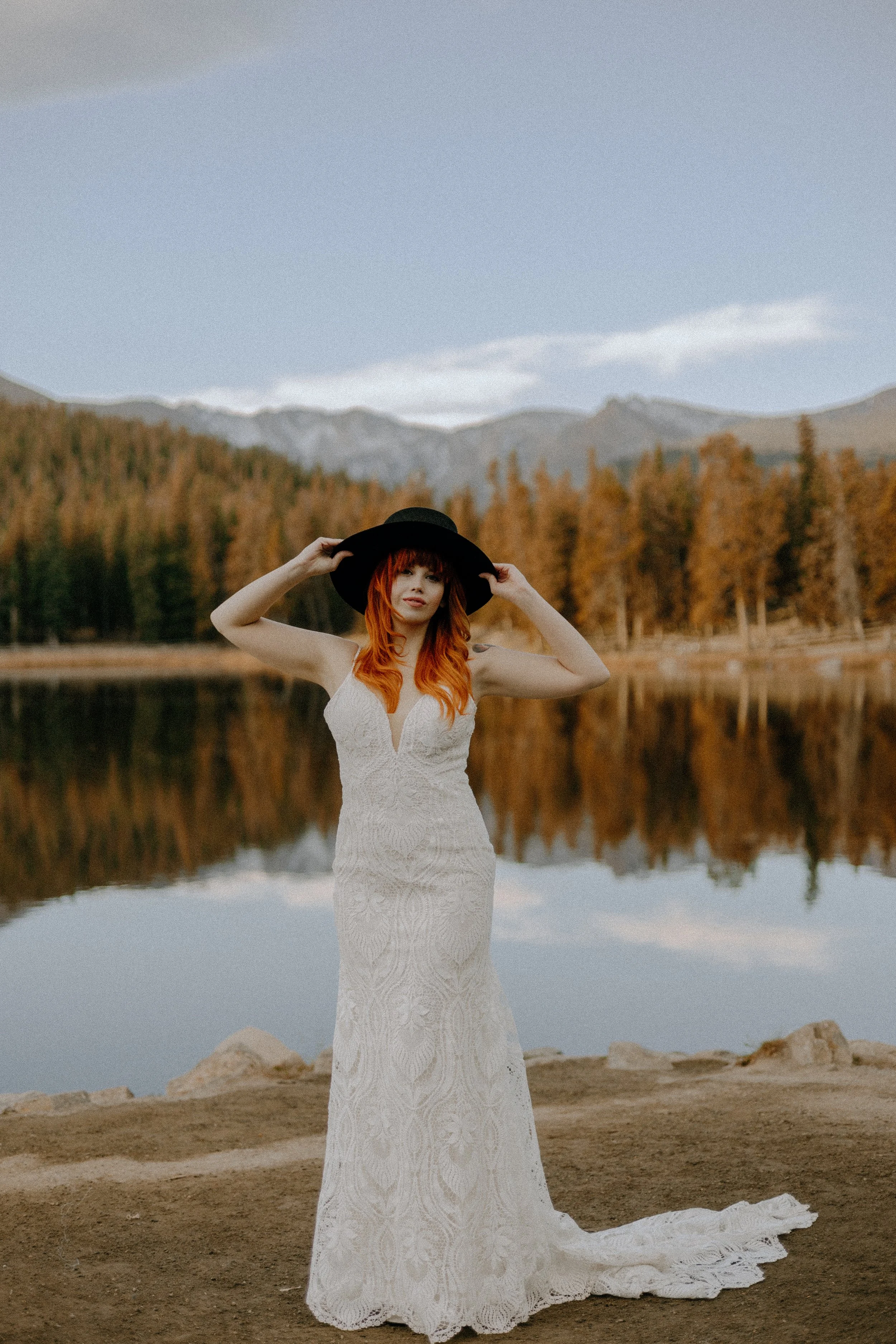Houston & Texas Wedding & Elopement Photography – Bride gazing out with veil and bouquet at Echo Lake Colorado elopement.