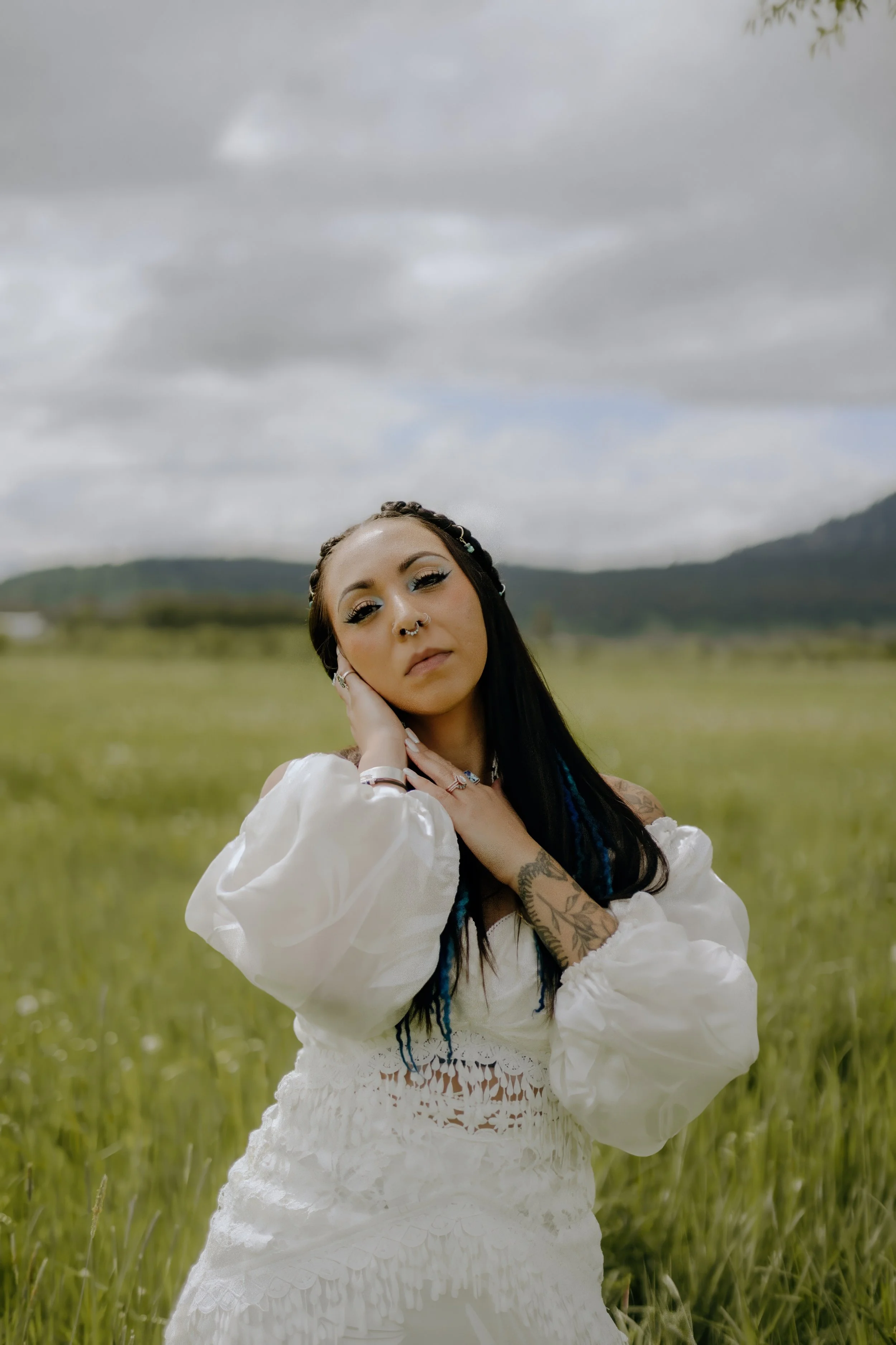 Houston & Texas Wedding & Elopement Photography – Bride portraits in field at Diamond Cross Ranch with Grand Tetons background.
