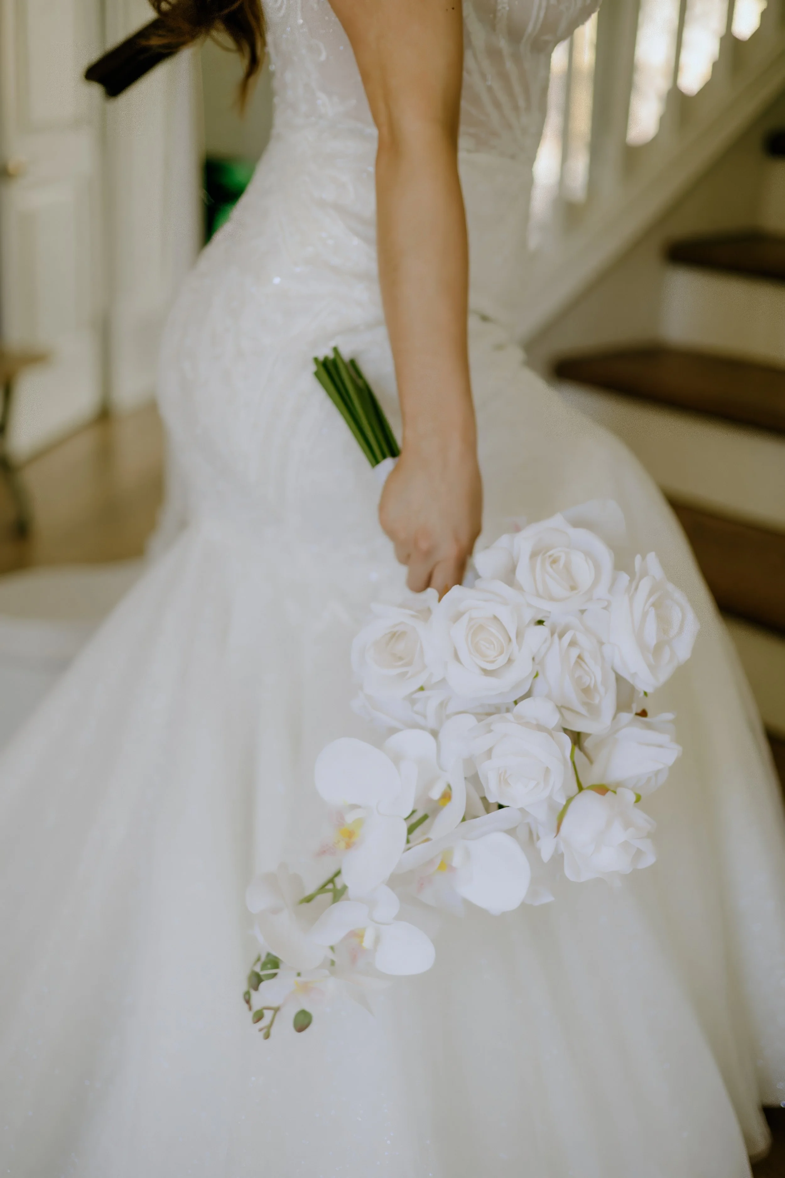 Houston & Texas Family, Couples, Newborn, Maternity, Bridal Photography – Bride tying shoes on staircase, candid bridal moment, Houston.