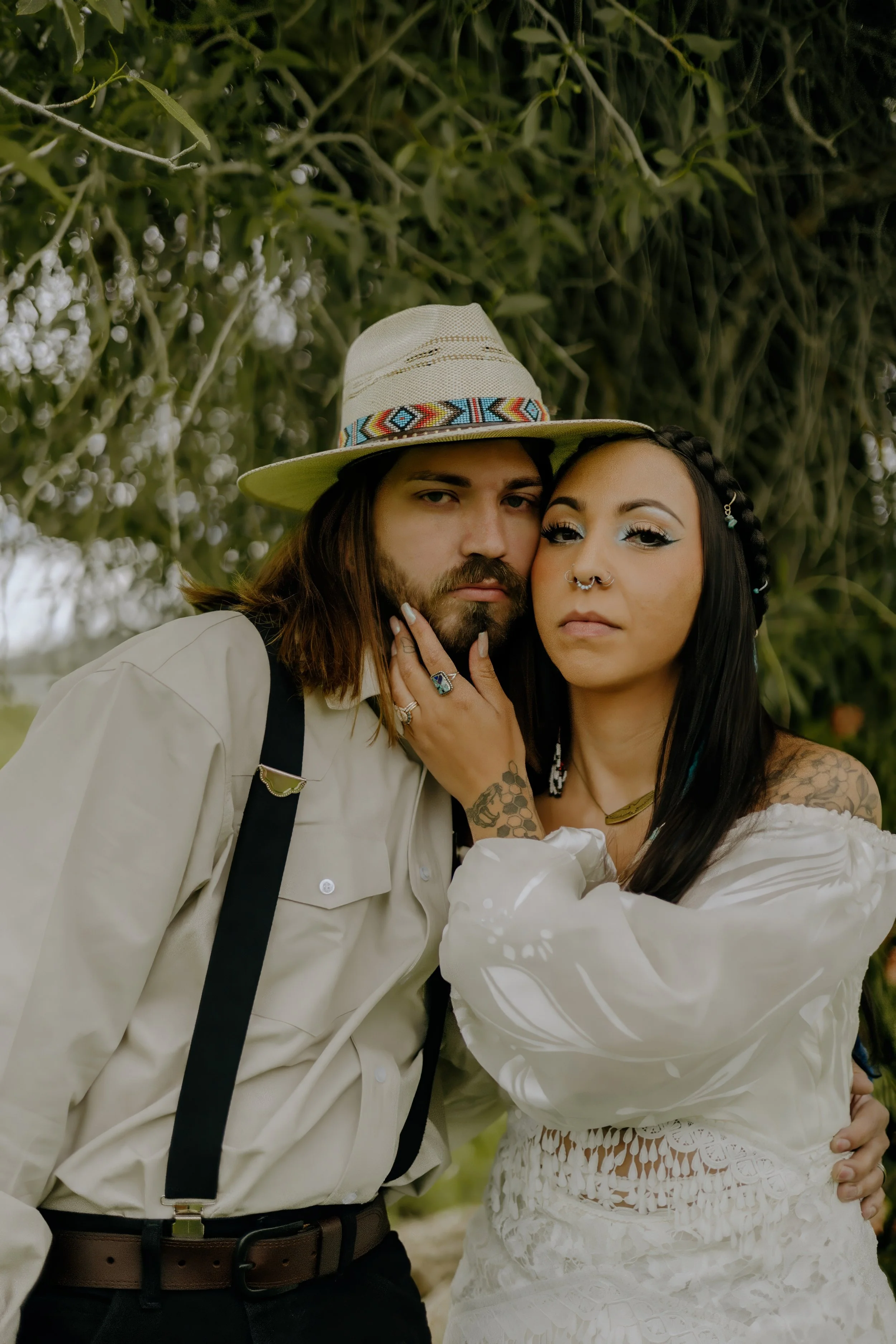 Houston & Texas Wedding & Elopement Photography – Couple embracing in serene Wyoming field at Diamond Cross Ranch.