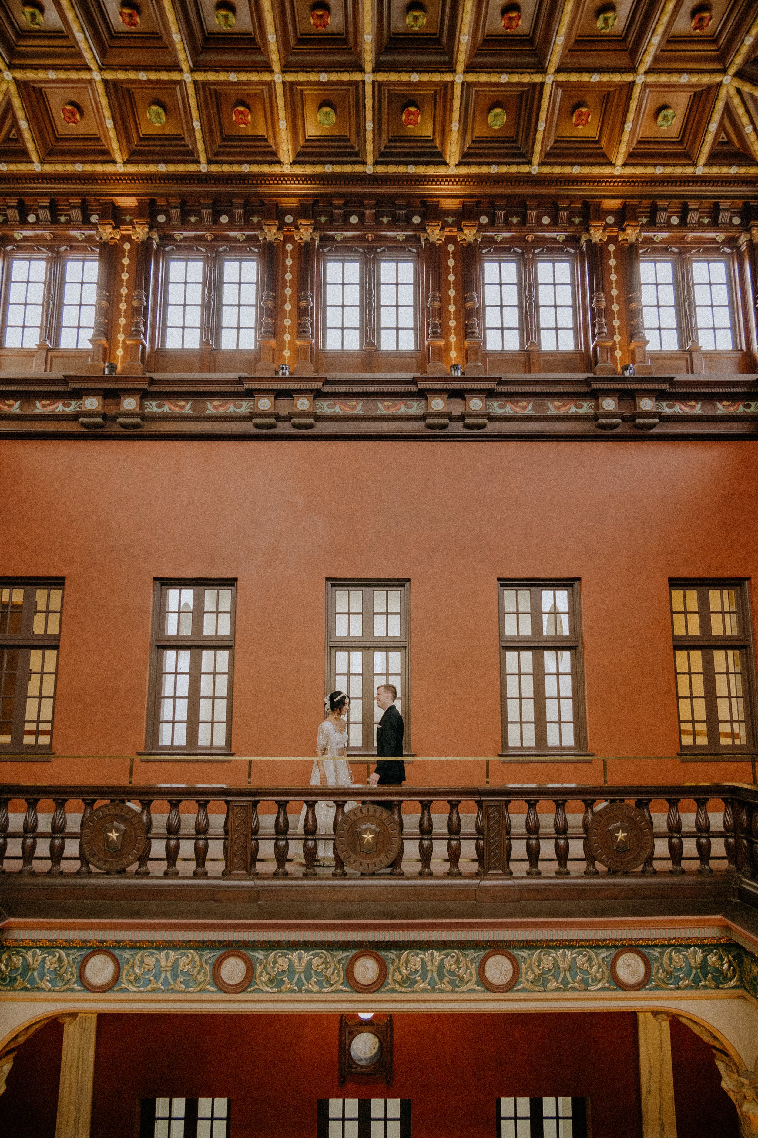 Wedding & Elopement Photography, Couple standing on a balcony at Julia Ideson Historic library