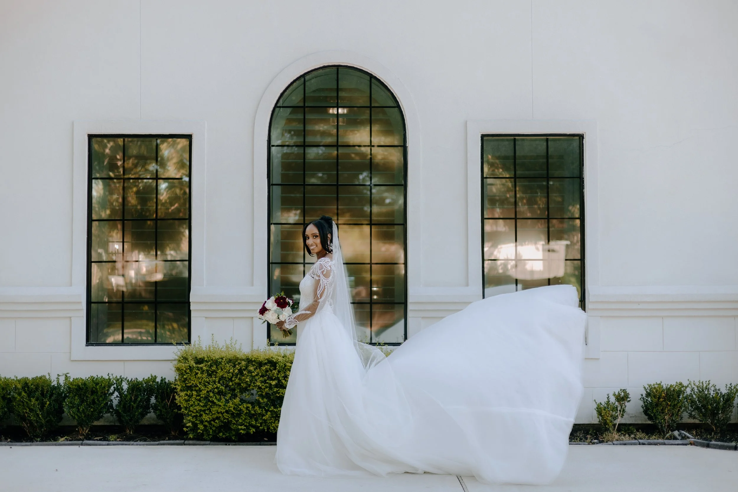 Houston & Texas Family, Couples, Newborn, Maternity, Bridal Photography – Elegant bride with flowing train, Peach Orchard Venue outdoor photo.