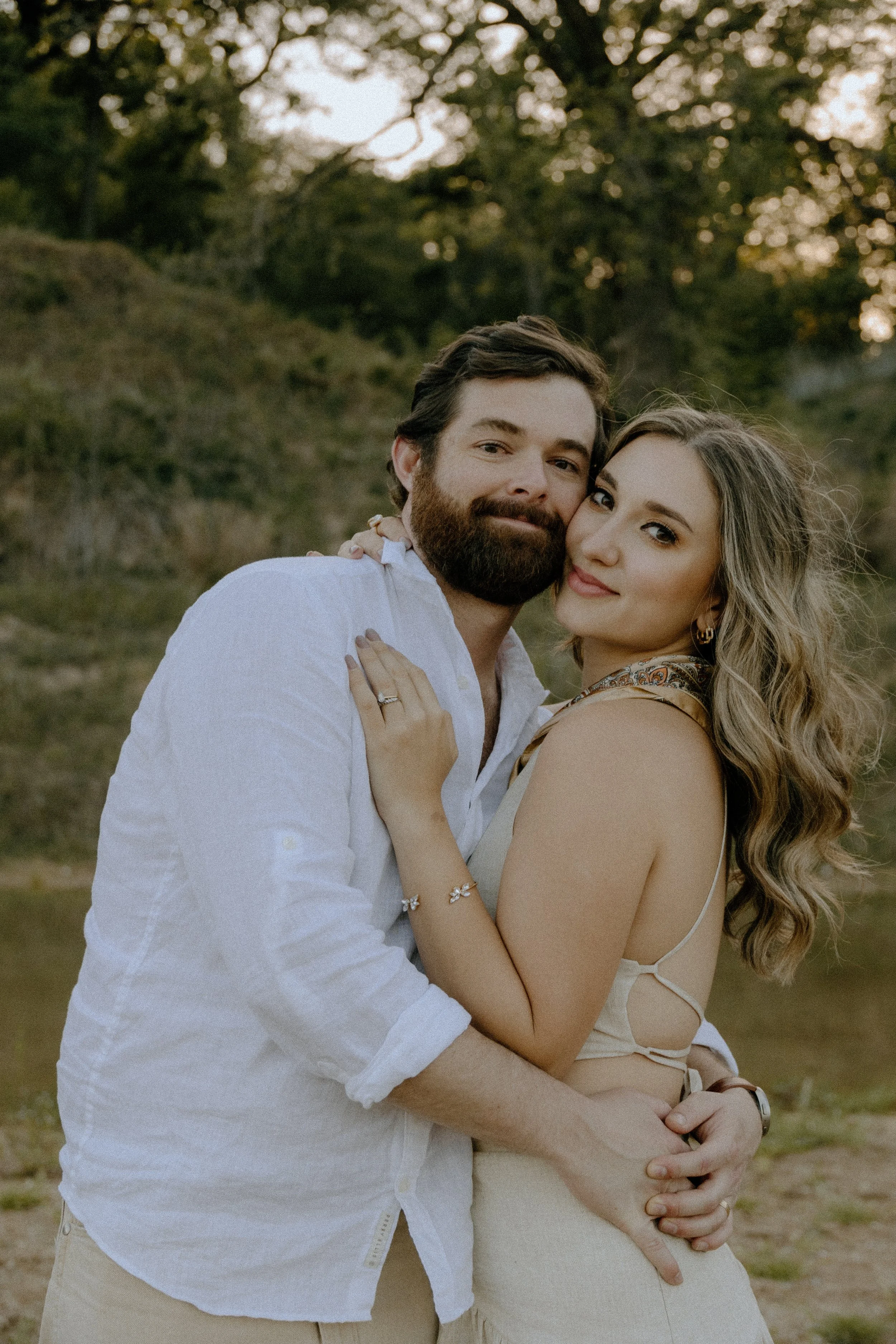 Houston & Texas Family, Couples, Newborn, Maternity, Bridal Photography – Romantic embrace at sunset in Austin TX wildflower portraits.