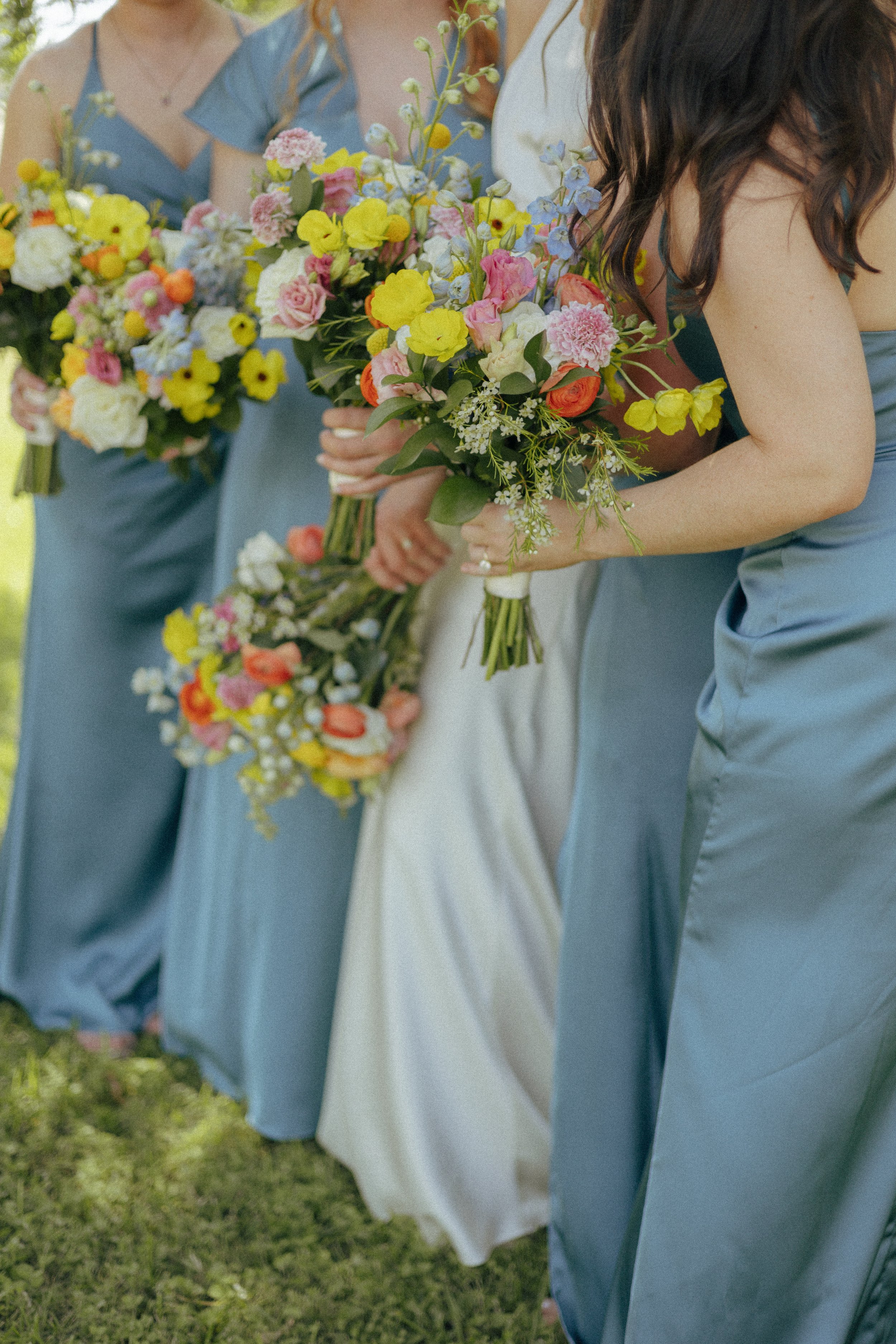 Wedding & Elopement Photography, close up of bridesmaids flower bouquets