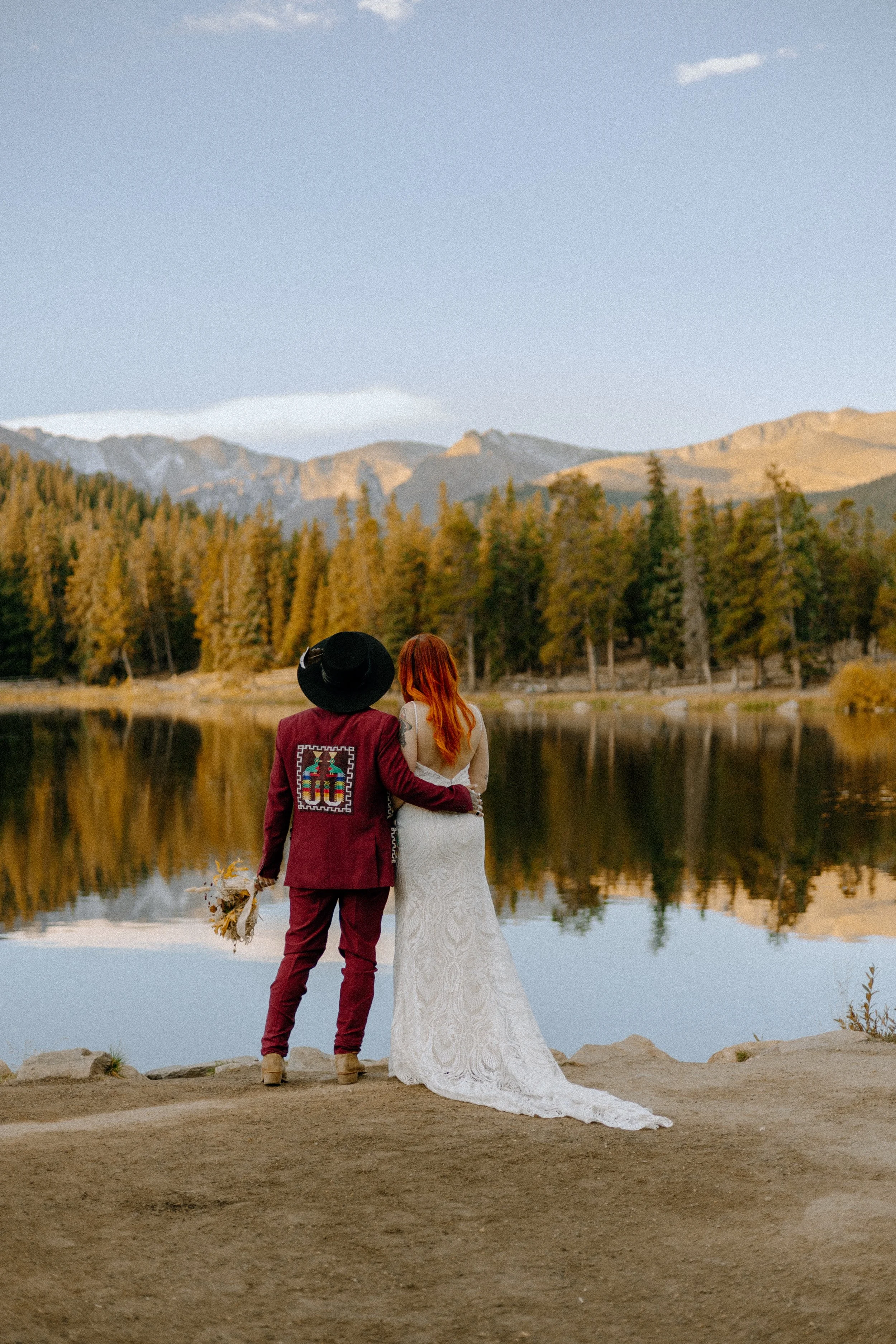 Houston & Texas Wedding & Elopement Photography – Couple side by side overlooking water at Echo Lake Colorado elopement.