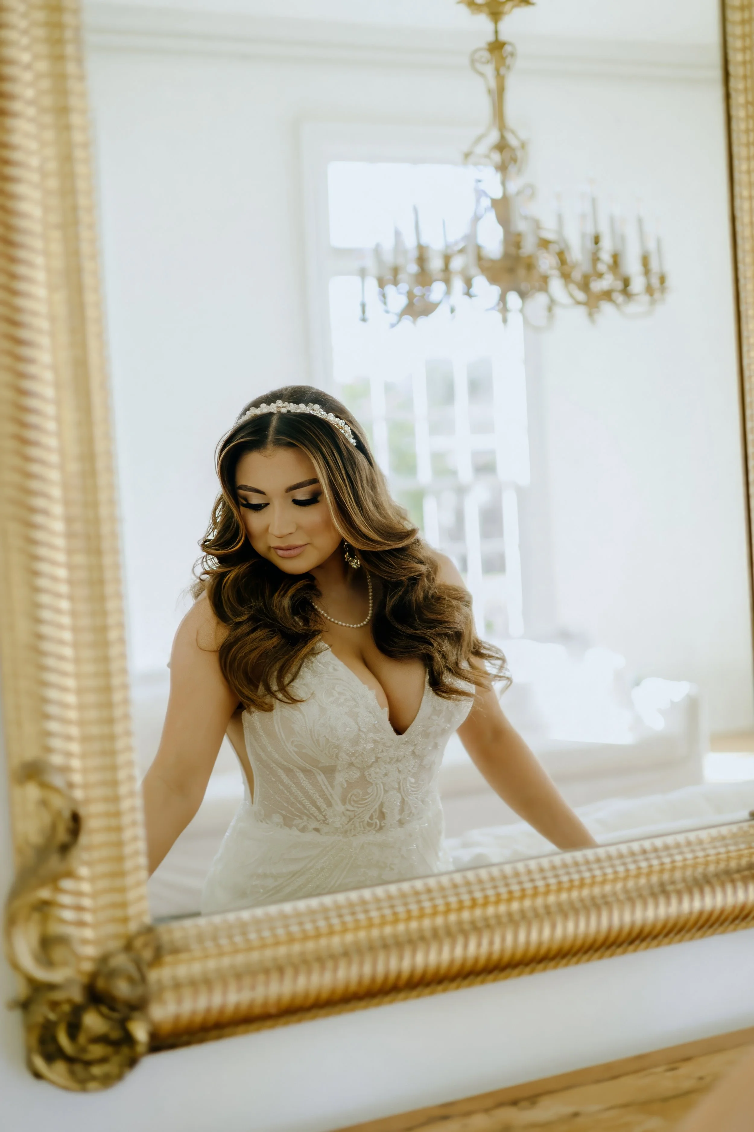 Houston & Texas Family, Couples, Newborn, Maternity, Bridal Photography – Bride holding bouquet with lace gown, luminous Houston space.