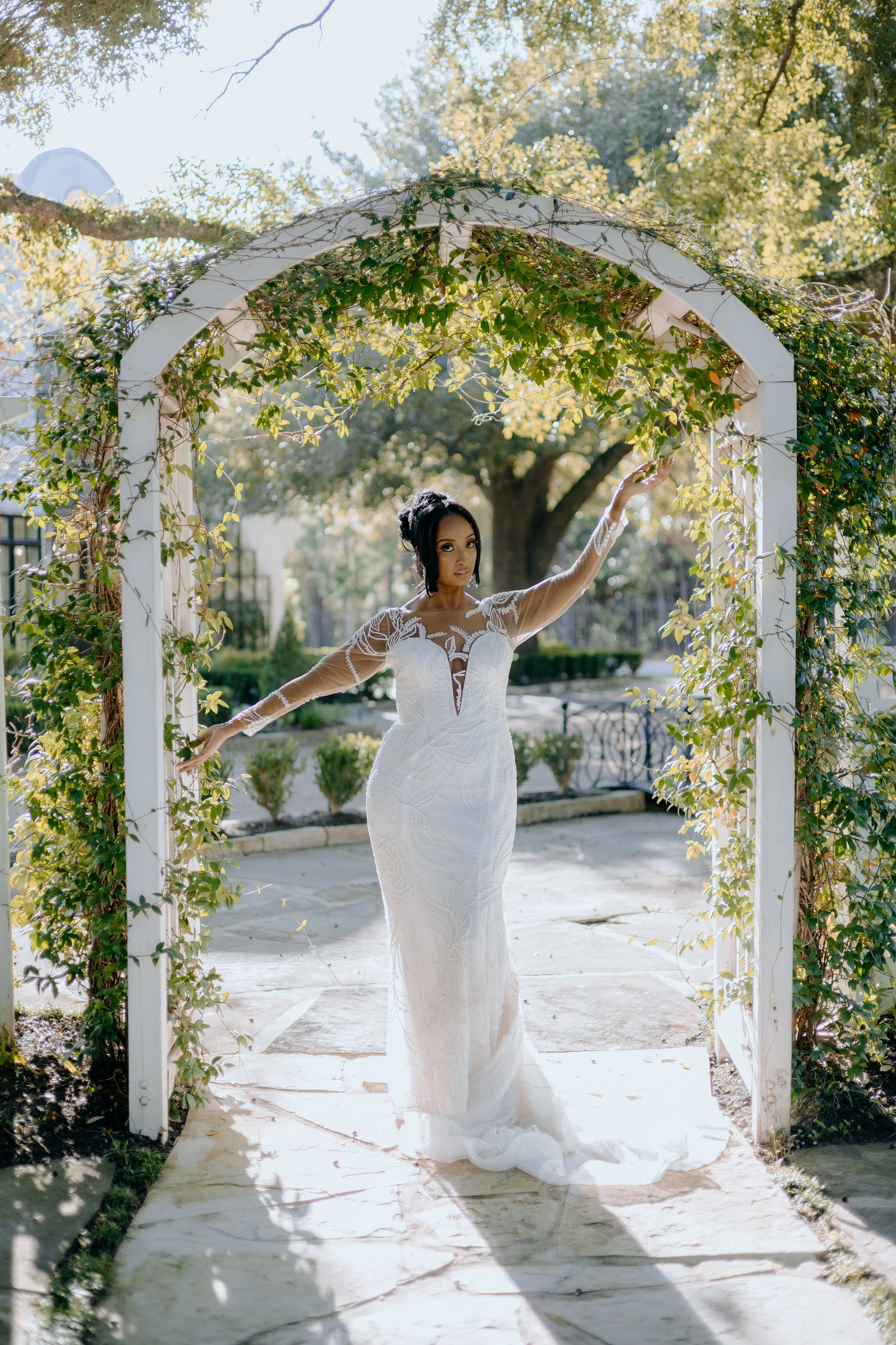 Houston & Texas Family, Couples, Newborn, Maternity, Bridal Photography – Bride posing outdoors by stone wall, Peach Orchard Venue.