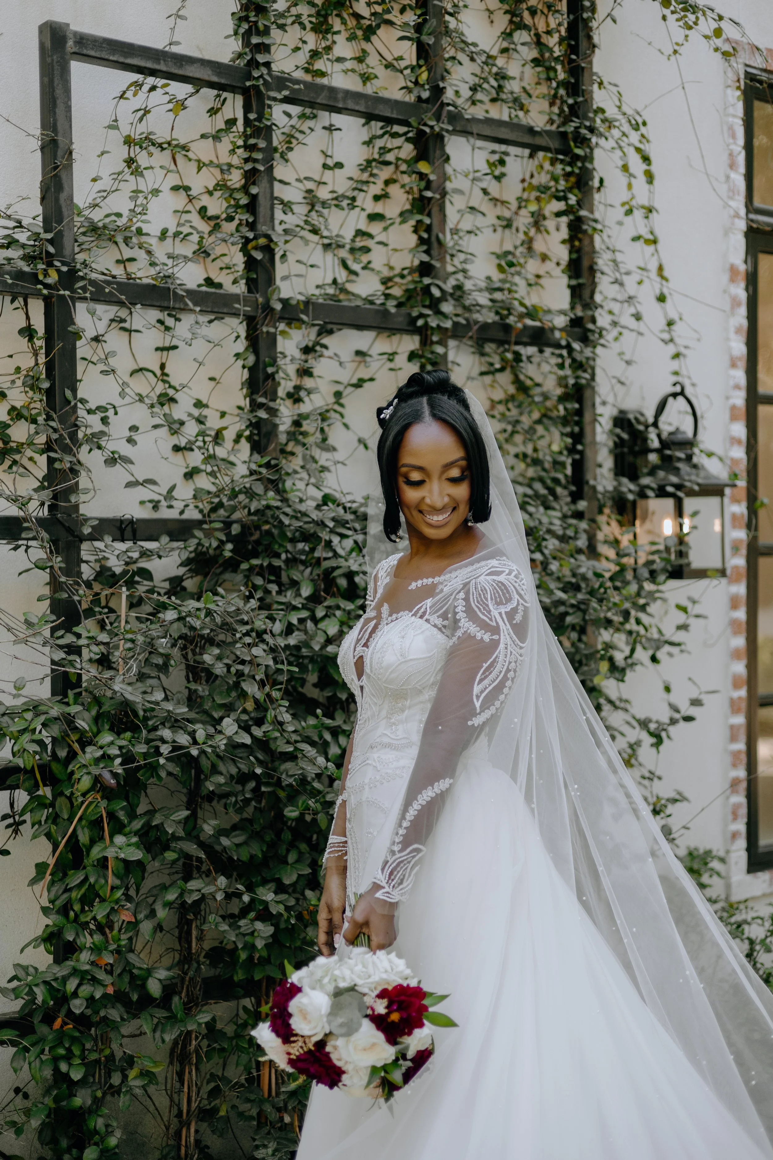Houston & Texas Family, Couples, Newborn, Maternity, Bridal Photography – Bride standing near ivy-covered wall, Peach Orchard Venue.
