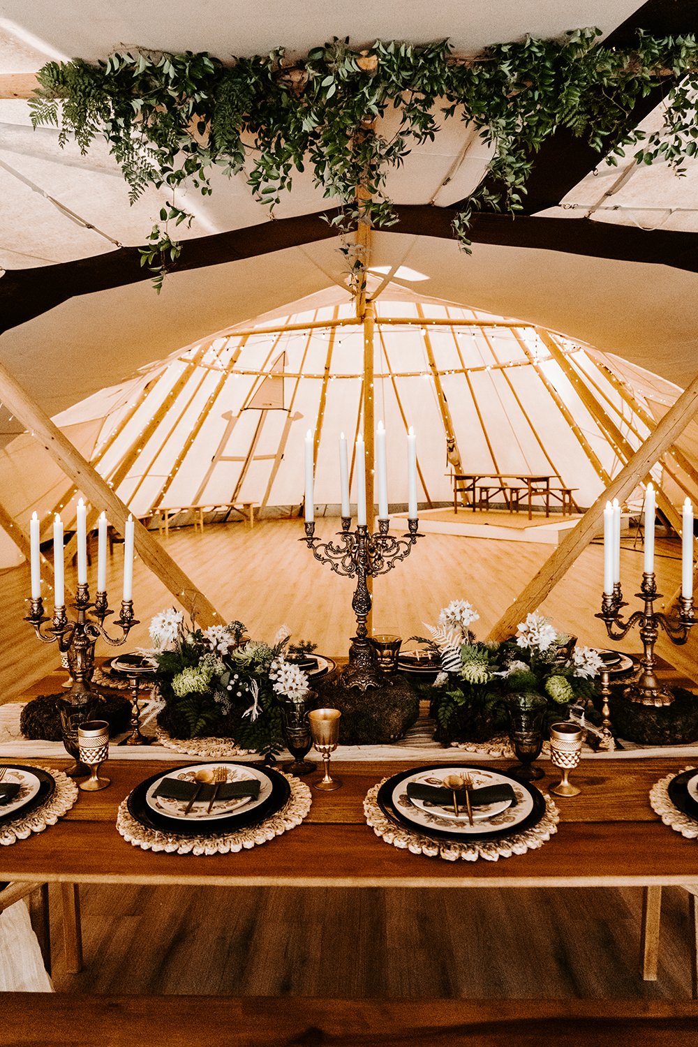 Wedding & Elopement Photography, Elegant wedding table setting with fine china, glassware, and floral arrangements"