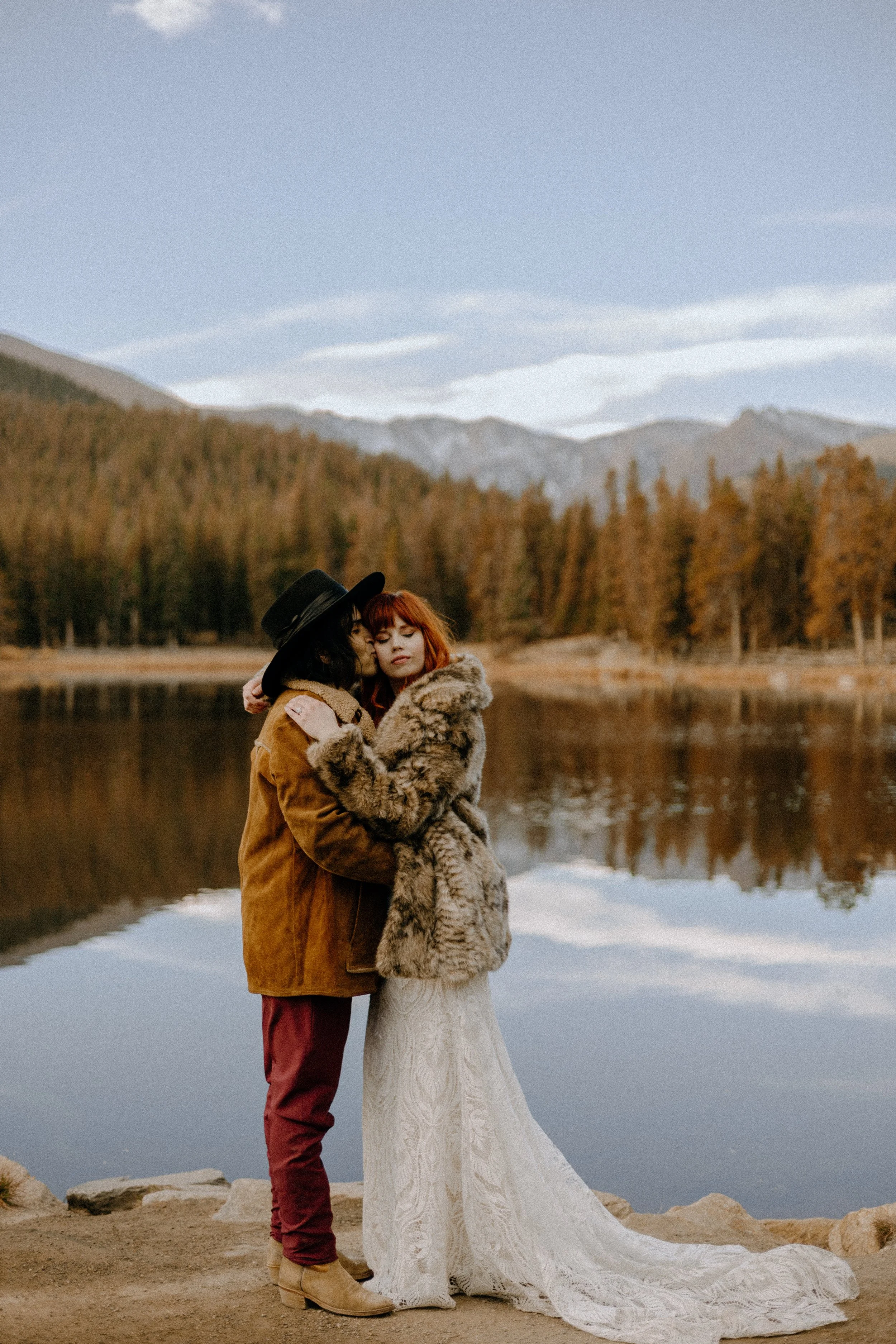 Houston & Texas Wedding & Elopement Photography – Couple holding each other in fall attire near Echo Lake Colorado.