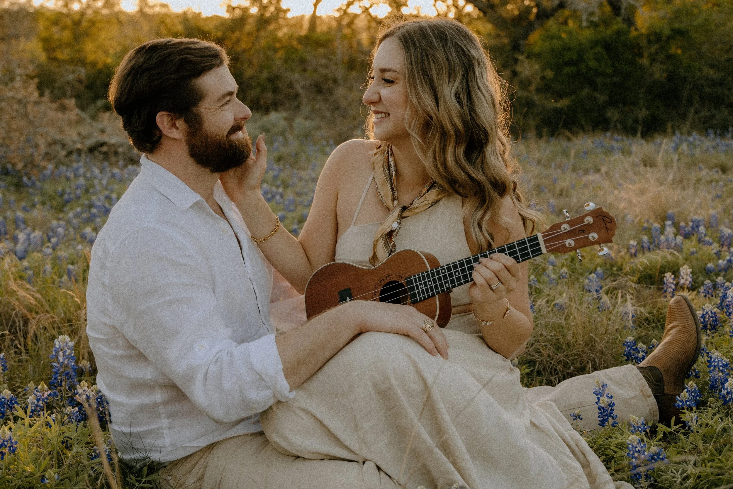 Houston & Texas Family, Couples, Newborn, Maternity, Bridal Photography – Couple smiling softly during Austin TX wildflower portraits.