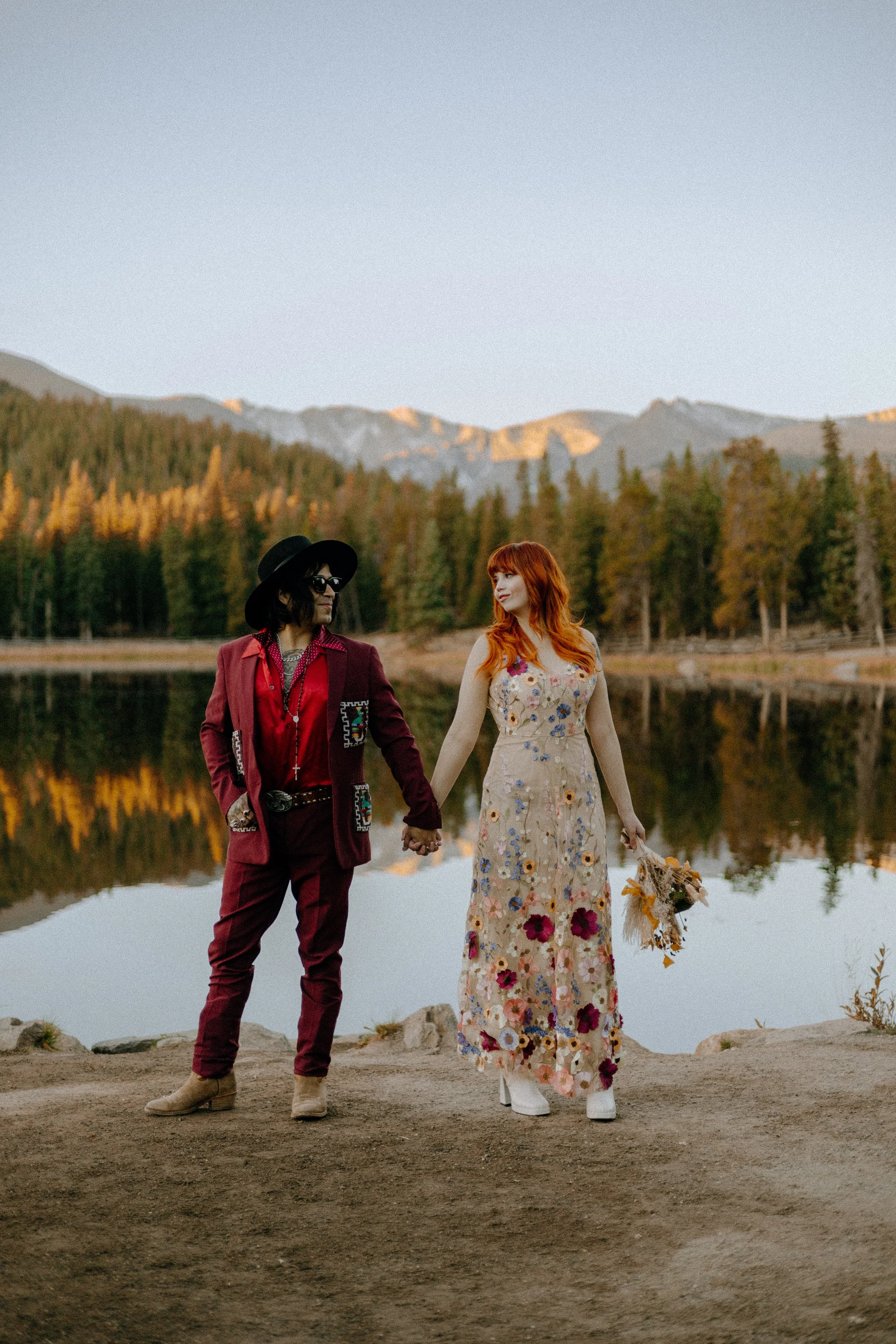 Houston & Texas Wedding & Elopement Photography – Bride in white gown holding bouquet near Echo Lake Colorado.