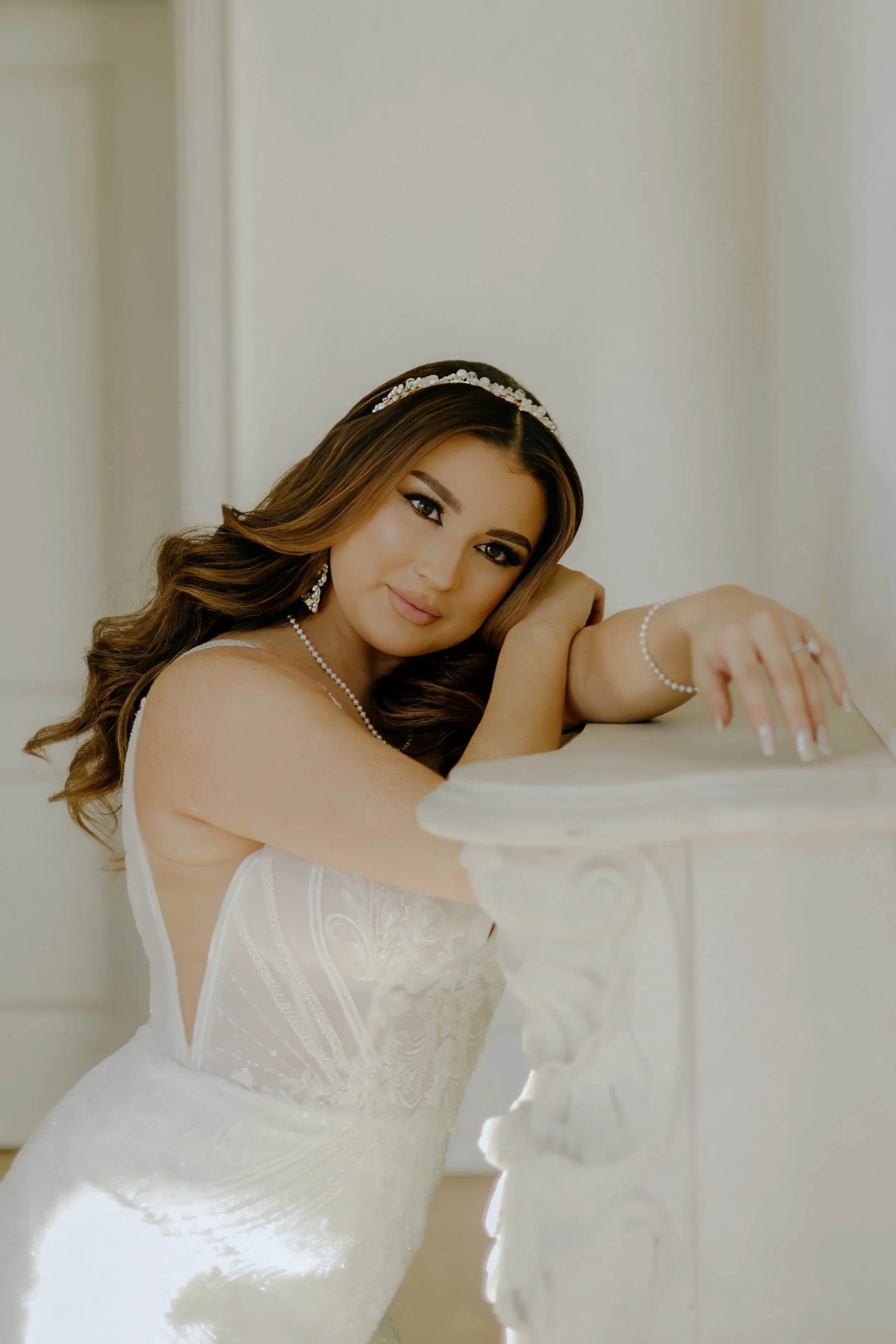 Houston & Texas Family, Couples, Newborn, Maternity, Bridal Photography – Full-length bridal portrait beneath gold chandelier, Houston.