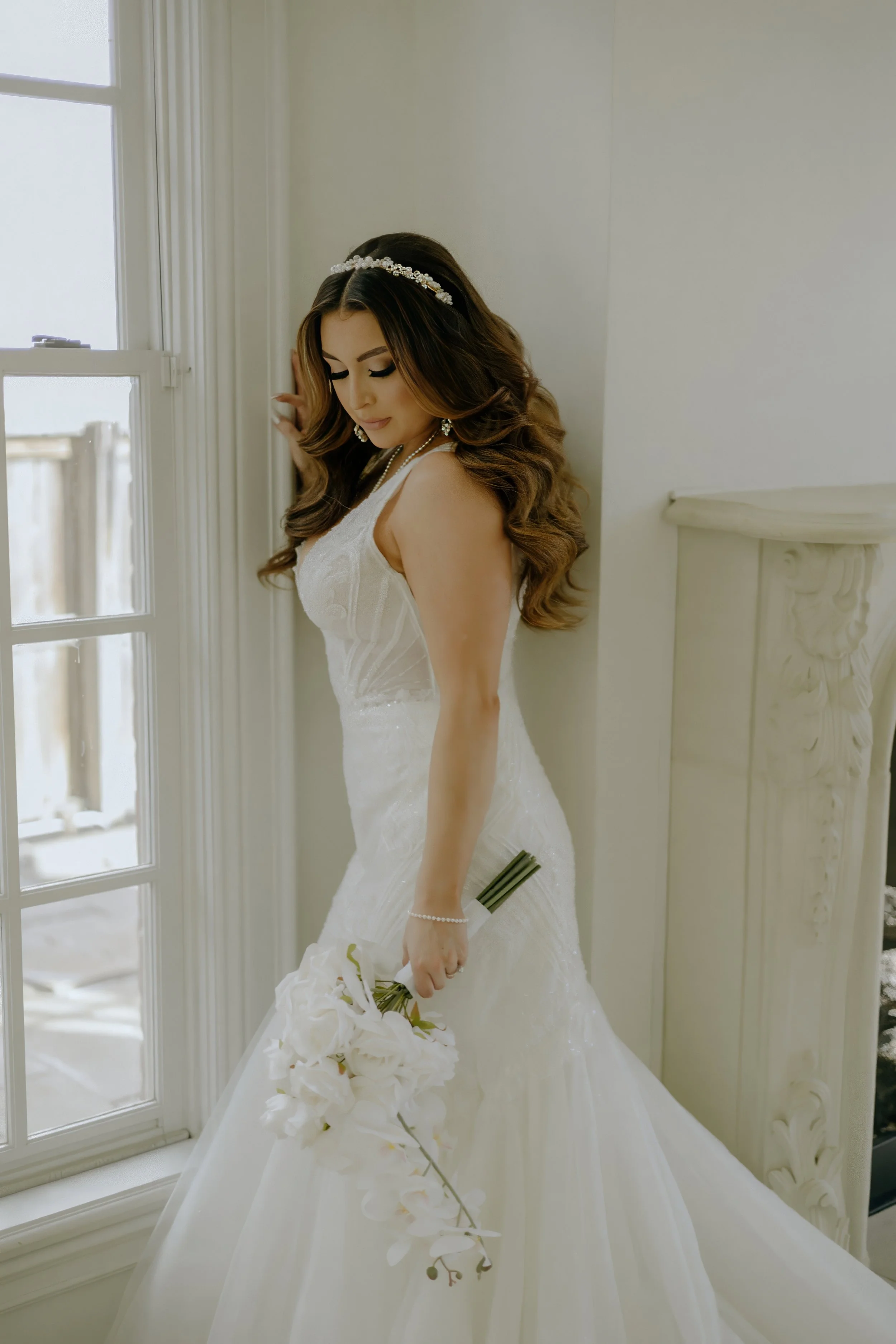 Houston & Texas Family, Couples, Newborn, Maternity, Bridal Photography – Elegant bridal portrait with flowing curls in upscale Houston setting.
