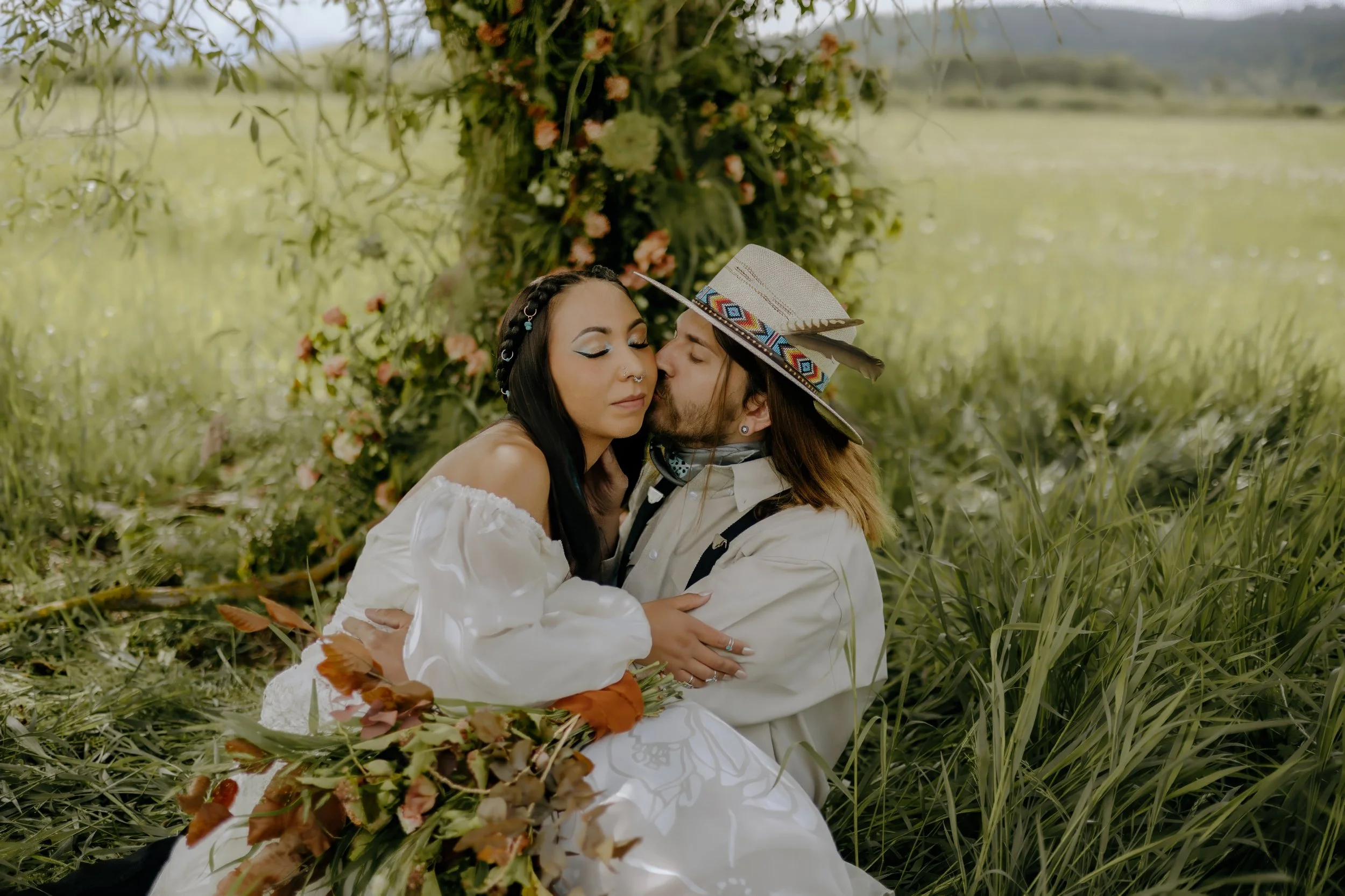 Houston & Texas Wedding & Elopement Photography – Bride and groom in a gentle embrace under leafy canopy at Diamond Cross Ranch.
