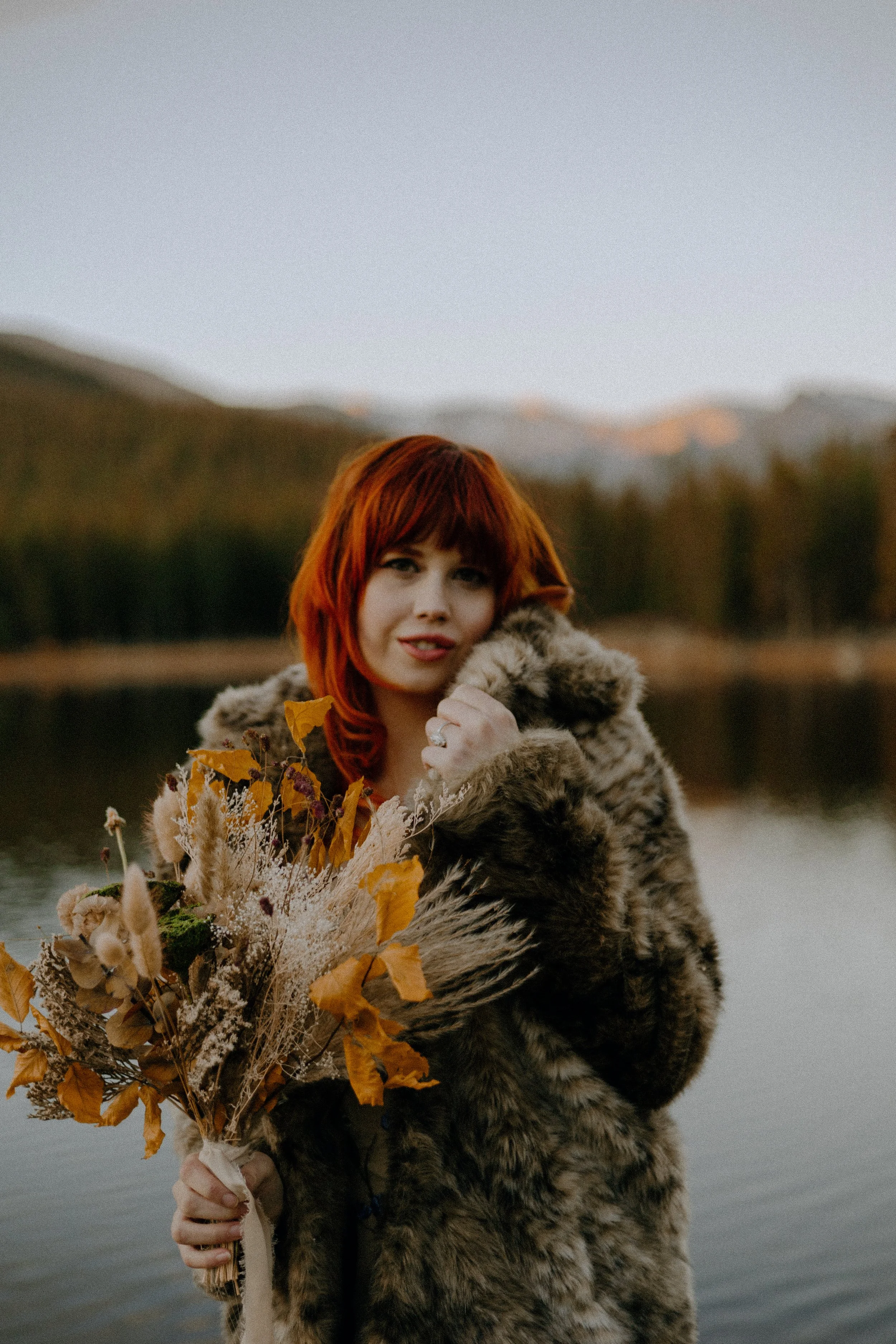 Houston & Texas Wedding & Elopement Photography – Bride portrait with fall bouquet at Echo Lake Colorado elopement.