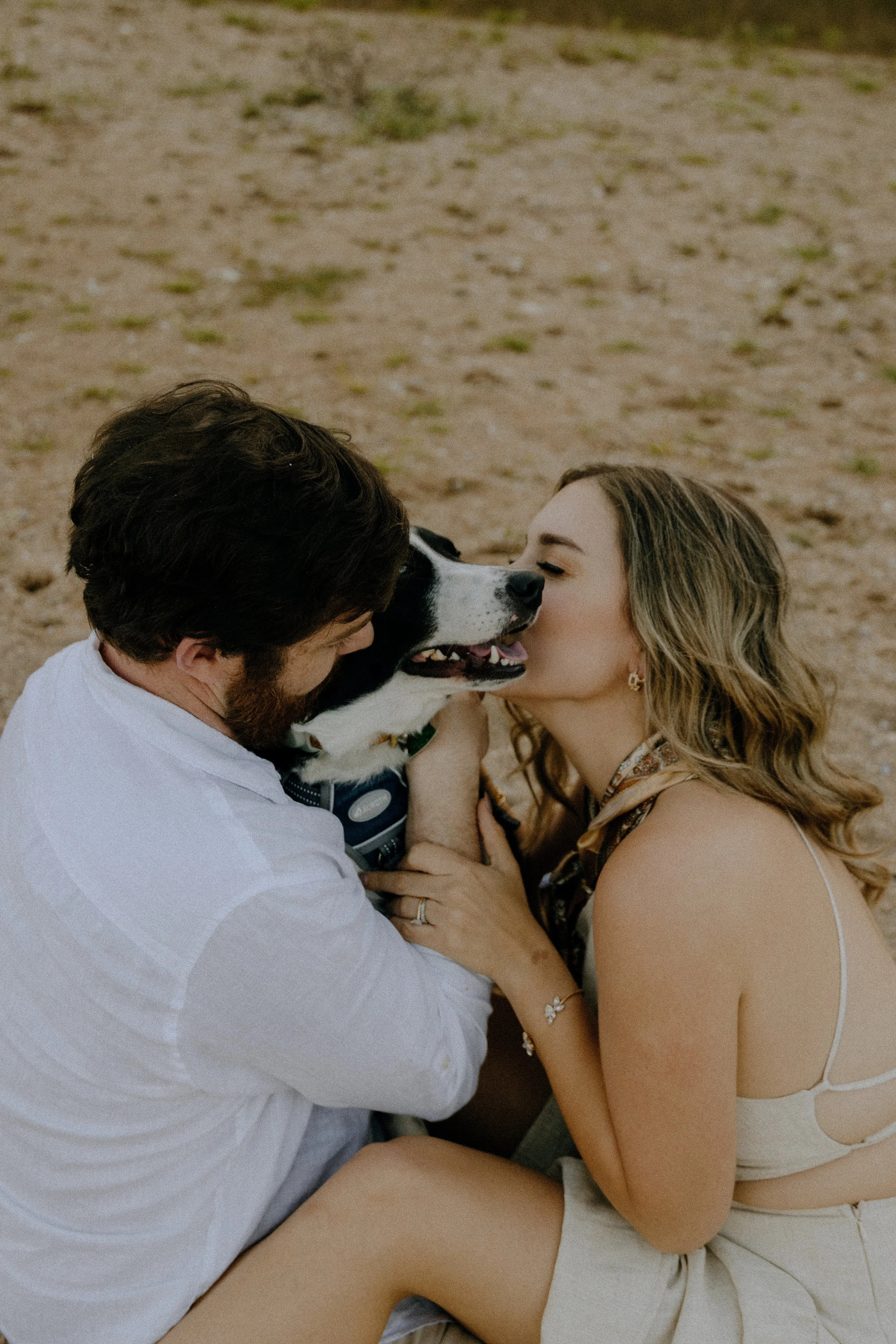 Houston & Texas Family, Couples, Newborn, Maternity, Bridal Photography – Playful moment kissing dog in Austin TX outdoor portraits.