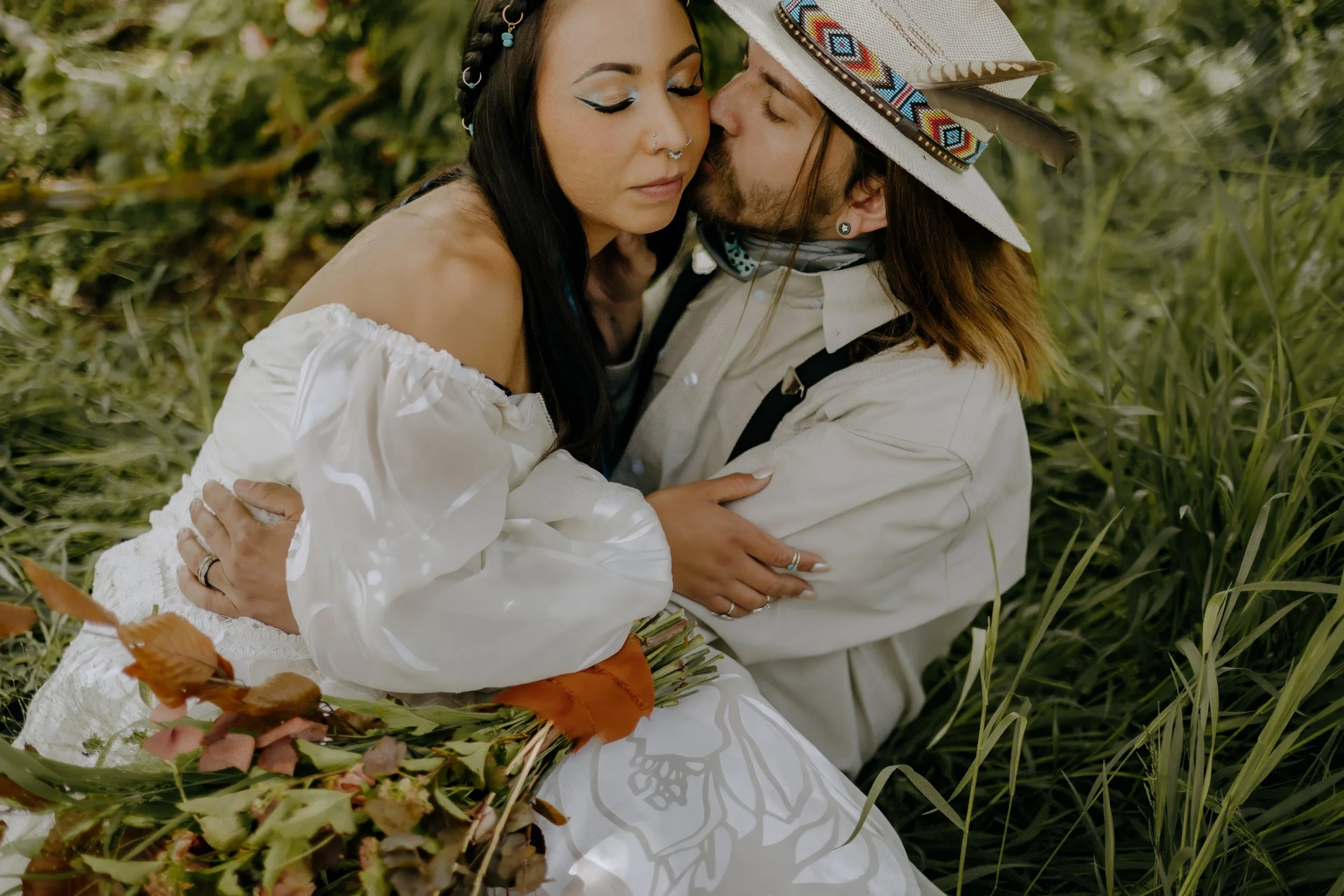 Houston & Texas Wedding & Elopement Photography – Close side-hug between couple near wildflower-lined field at Diamond Cross Ranch.