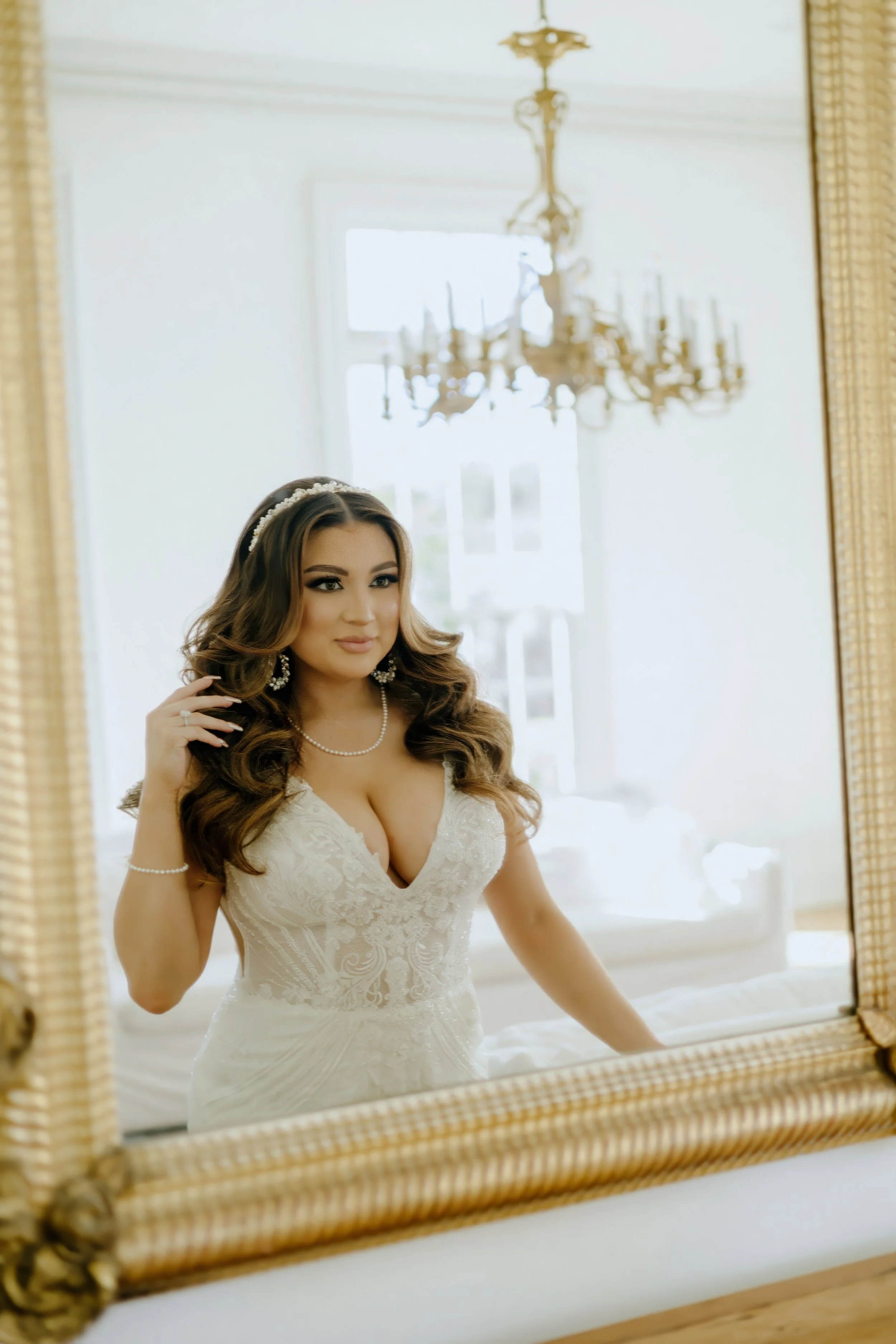 Houston & Texas Family, Couples, Newborn, Maternity, Bridal Photography – Bride captured in golden mirror reflection, Houston luxury setting.
