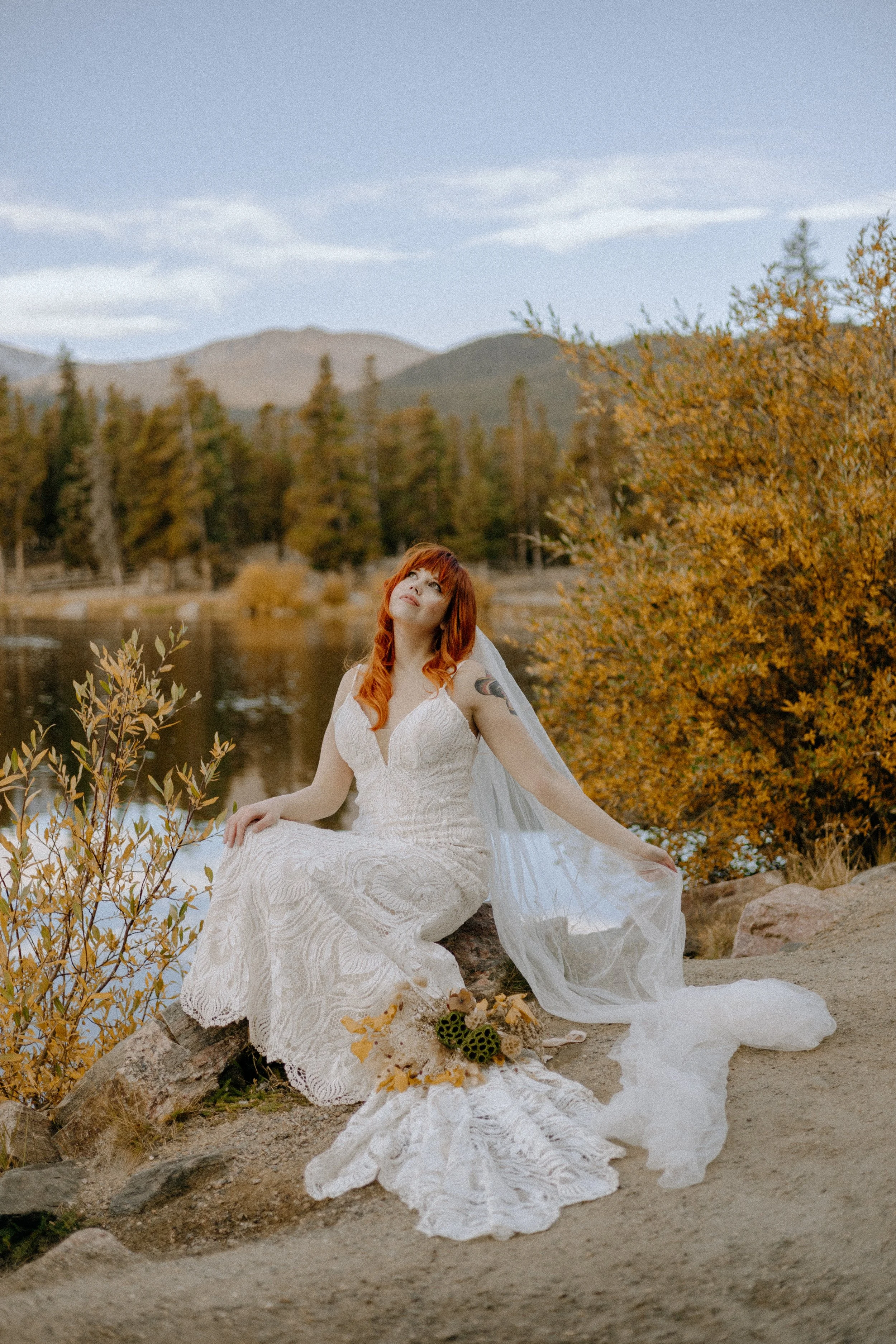 Houston & Texas Wedding & Elopement Photography – Bride framed by autumn trees during Echo Lake Colorado elopement.