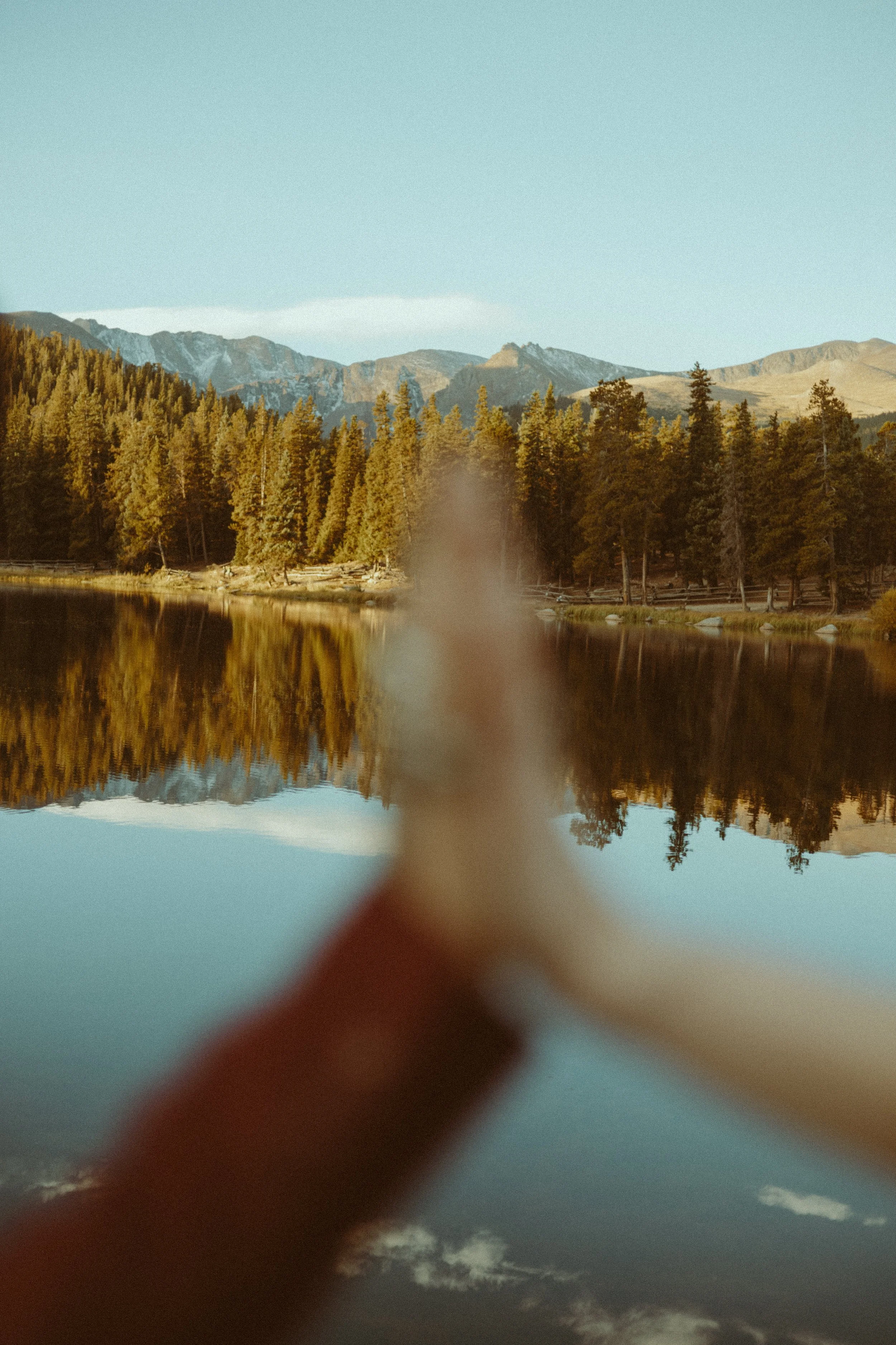 Houston & Texas Wedding & Elopement Photography – Bride and groom hand clasped with alpine reflections at Echo Lake Colorado.