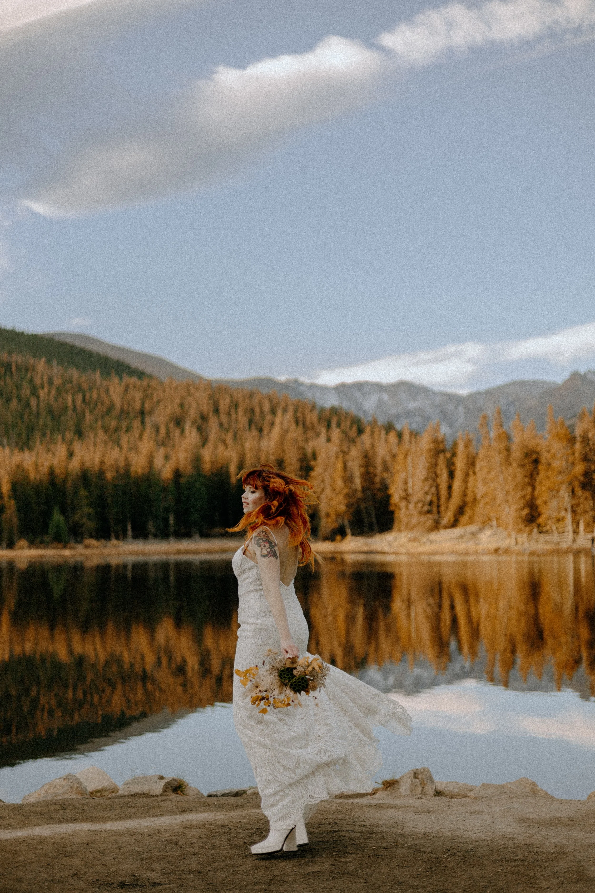 Houston & Texas Wedding & Elopement Photography – Bride standing alone in lace gown with Echo Lake reflections.